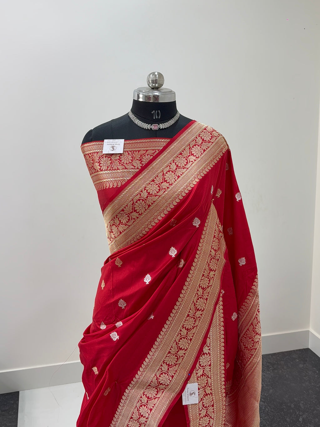 Handwoven pure katan silk saree with interlock weaving motifs with intricate silver and gold zari in red colour