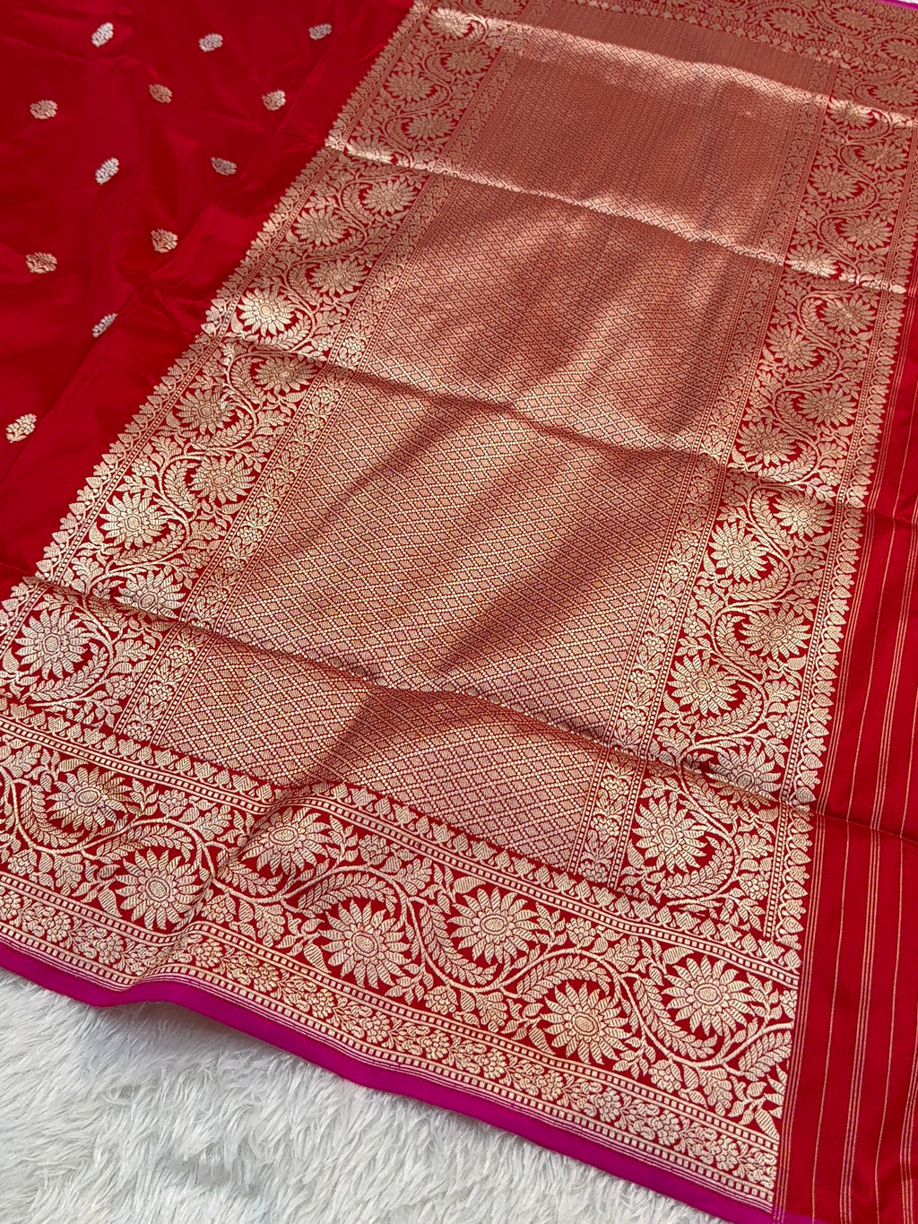 Handwoven pure katan silk saree in Red colour with interlock weaving motifs with intricate silver and gold zari with Rani Colour Edge