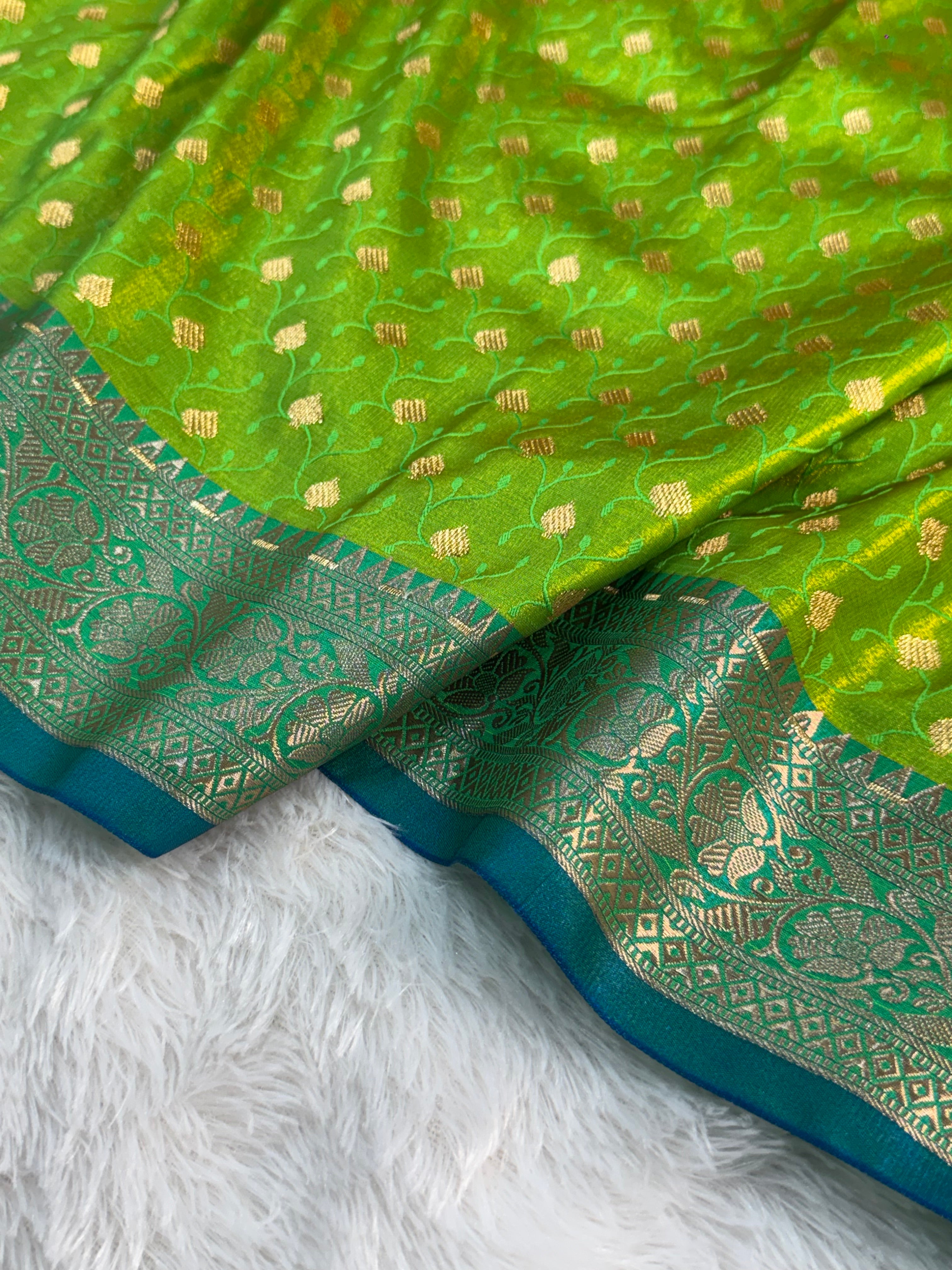 Banarasi satin silk saree in contrast Parrot green color with tanchoi design all over the body
