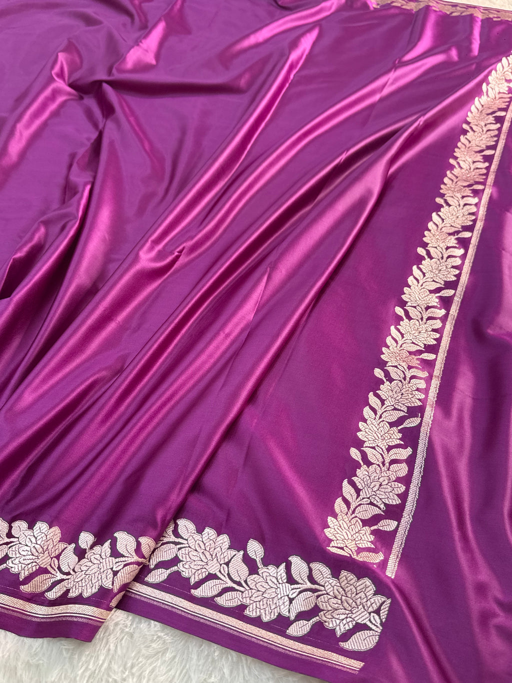 Banarasi Mashru Silk Saree with plain body and floral border Design in Majenta colour