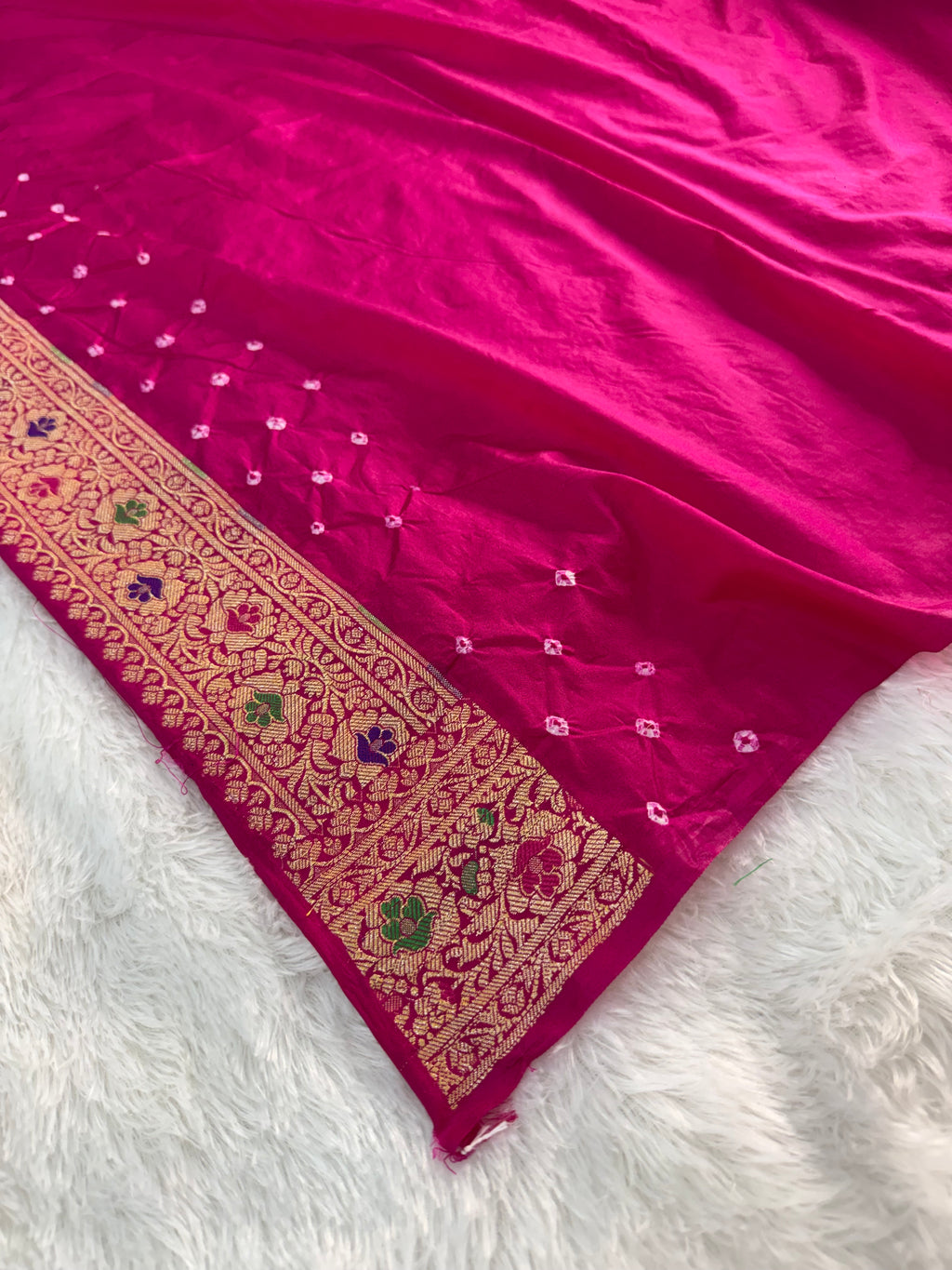 Banarasi Raw Silk Saree with Hand bandej all over in Motifs Design in Rani and Bottle Green Colour