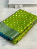 Banarasi satin silk saree in contrast Parrot green color with tanchoi design all over the body