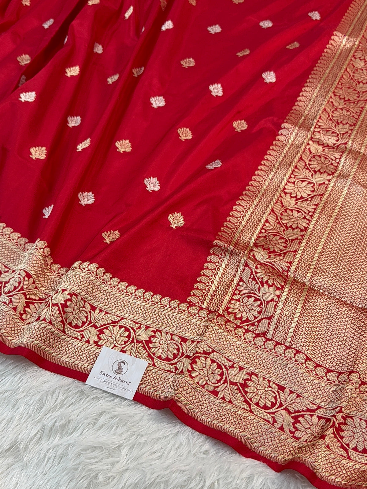 Handwoven pure katan silk saree with interlock weaving motifs with intricate silver and gold zari in red colour