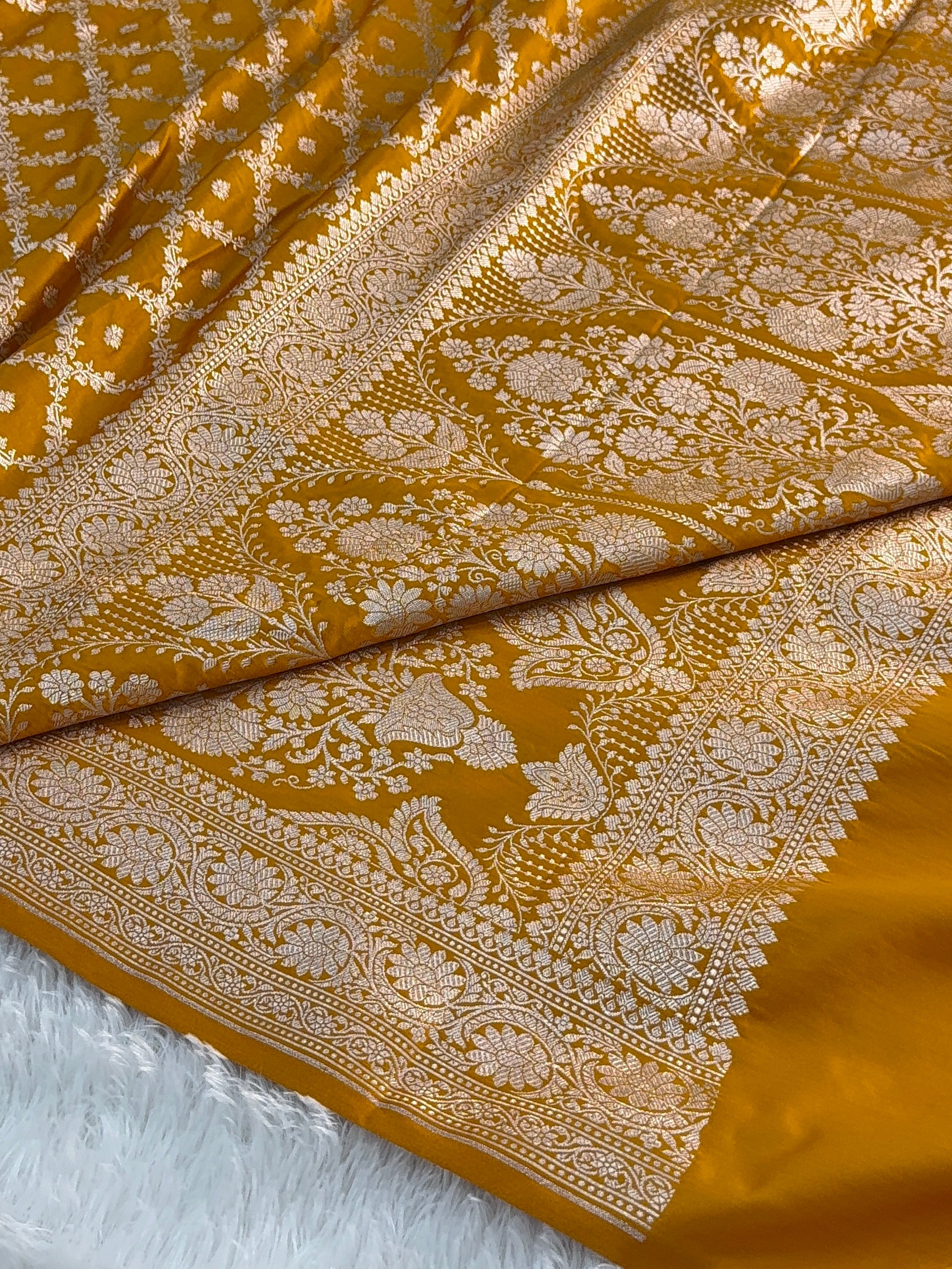 Banarasi mashru silk saree in chokdi jaal design in dark Yellow color