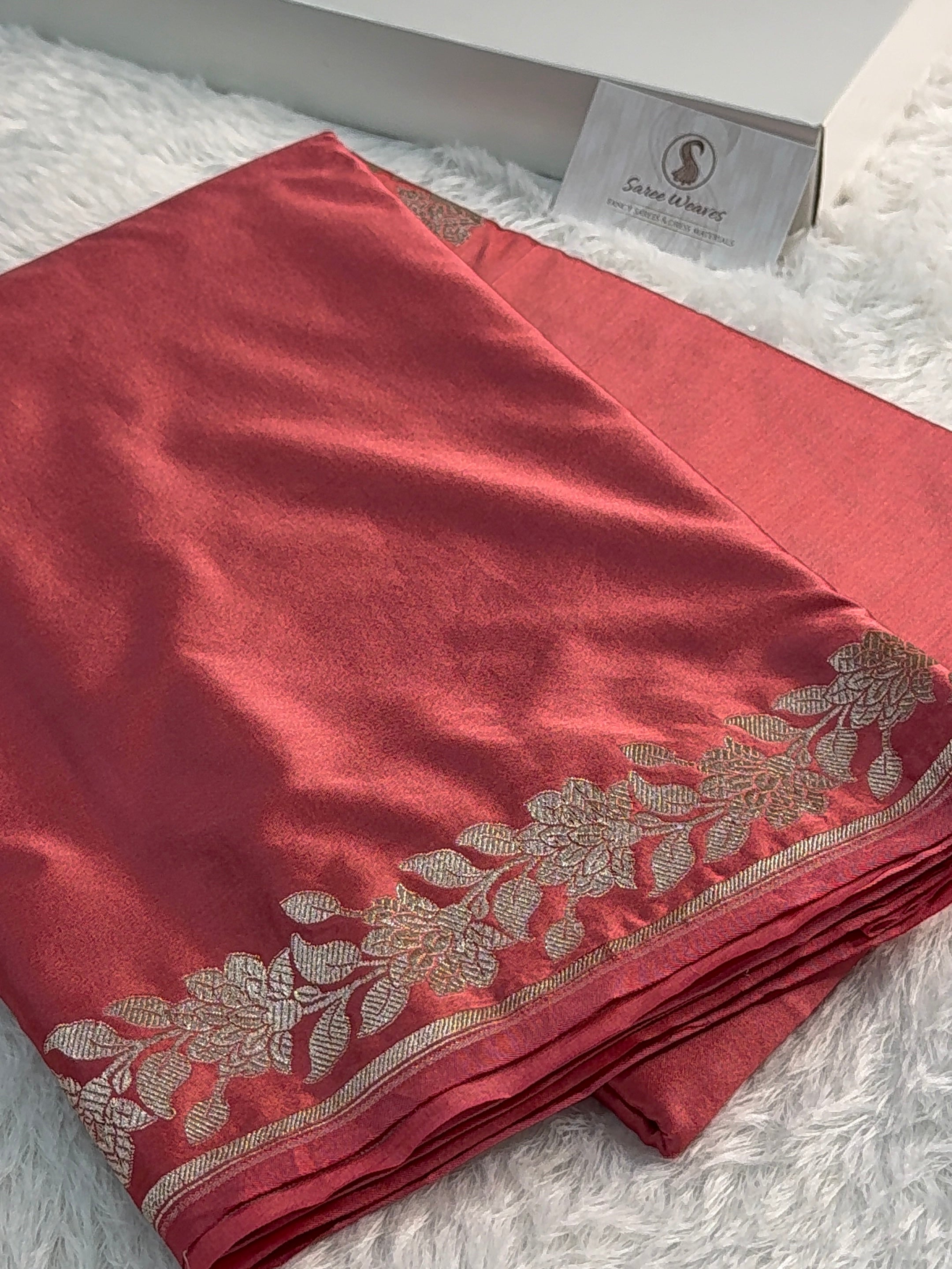 Banarasi Mashru Silk Saree with plain body and floral border Design in Rusty Pink colour
