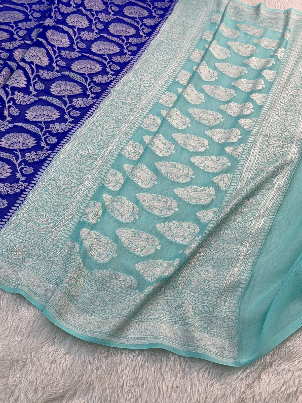 Banarasi Pure Khaddi Chiffon Saree  with Silver Zari Work In Floral Jaal Design in Royal Blue and Light Sea Green Colour Combination