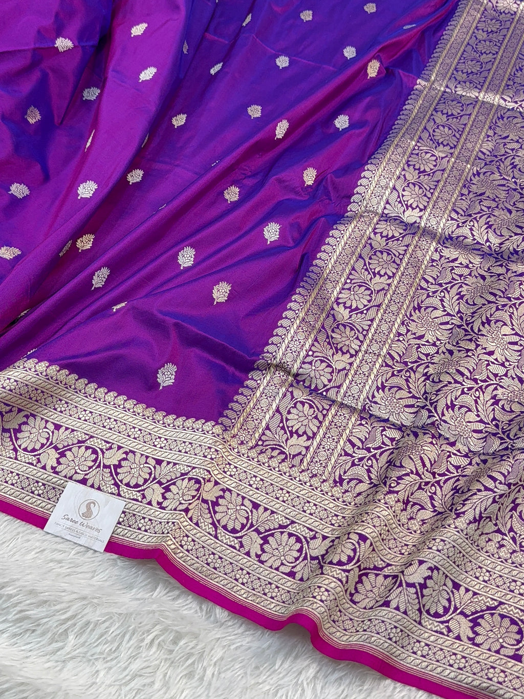Handwoven pure katan silk saree with interlock weaving motifs in intricate silver and gold zari with Rani Edge in Deep Violet colour