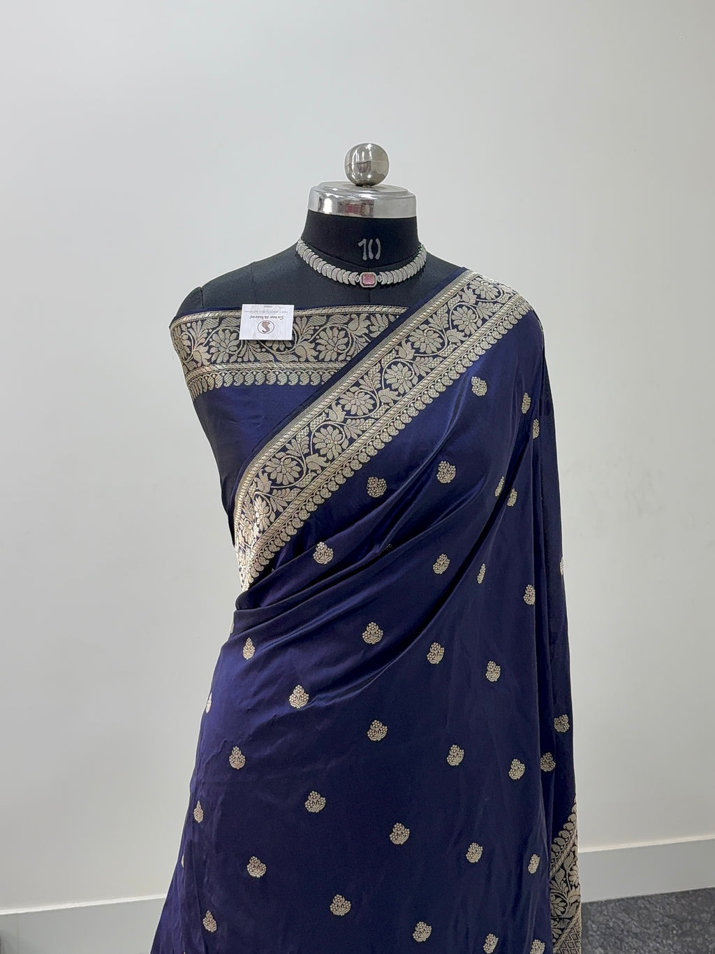 Handwoven pure katan silk saree with interlock weaving motifs in Light gold zari in Navy Blue Colour