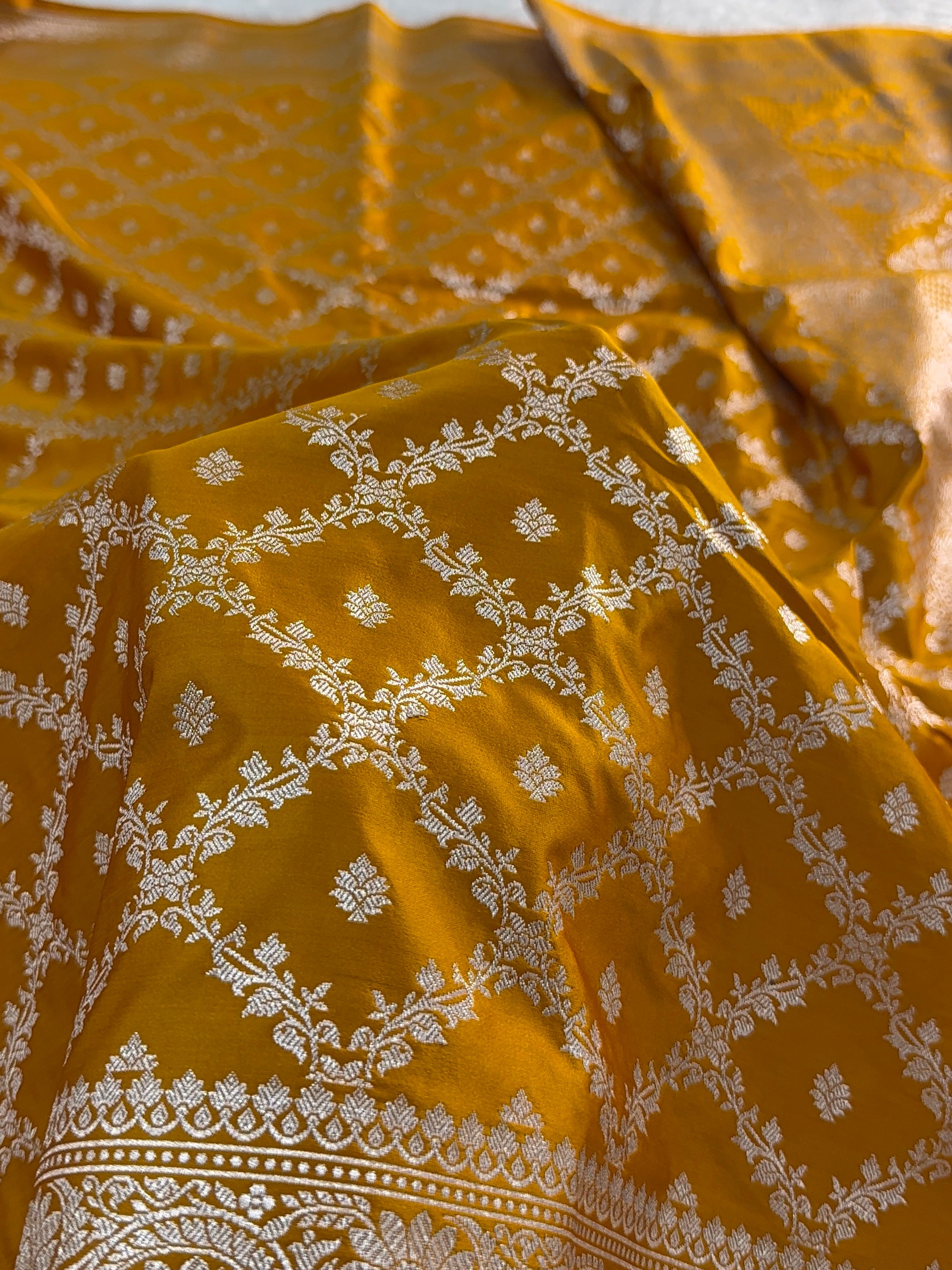 Banarasi mashru silk saree in chokdi jaal design in dark Yellow color