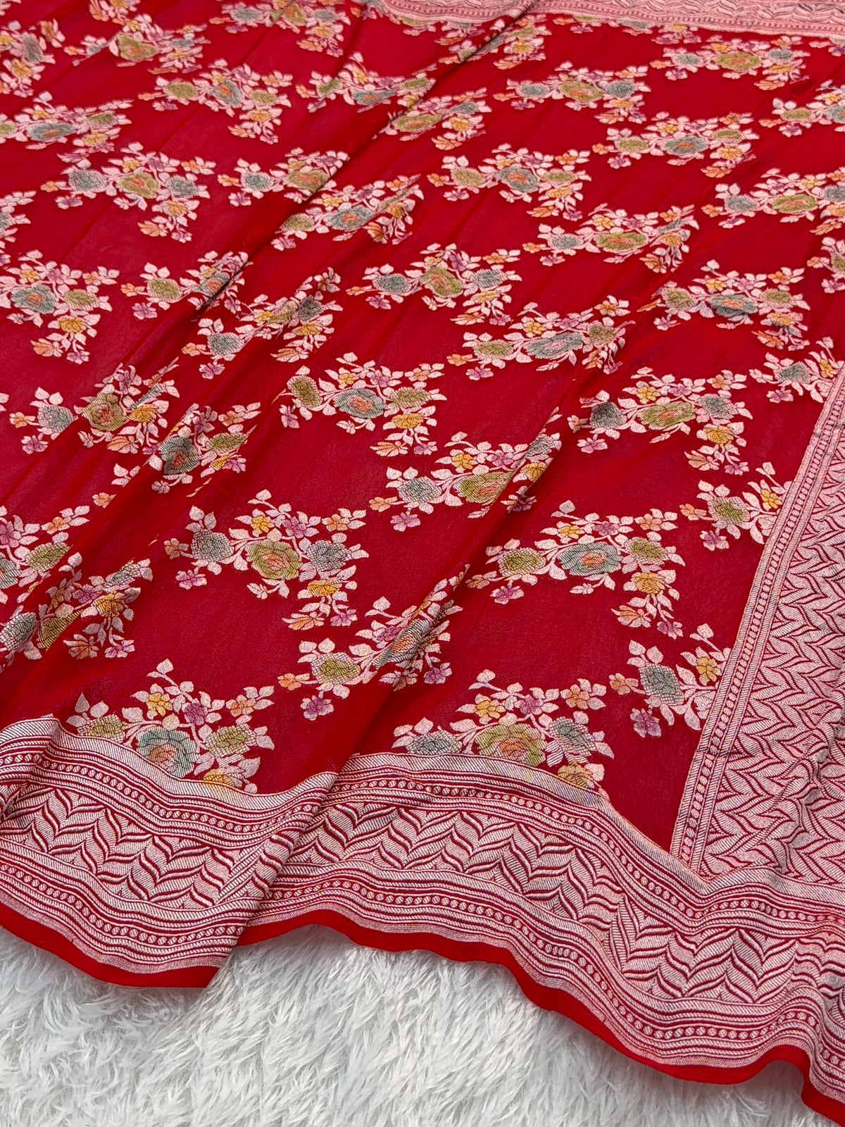 Banarasi Pure Khaddi Chiffon Saree  with Silver Zari Work In Floral Jaal Design with Meenakari by handbrush in Light Red Colour