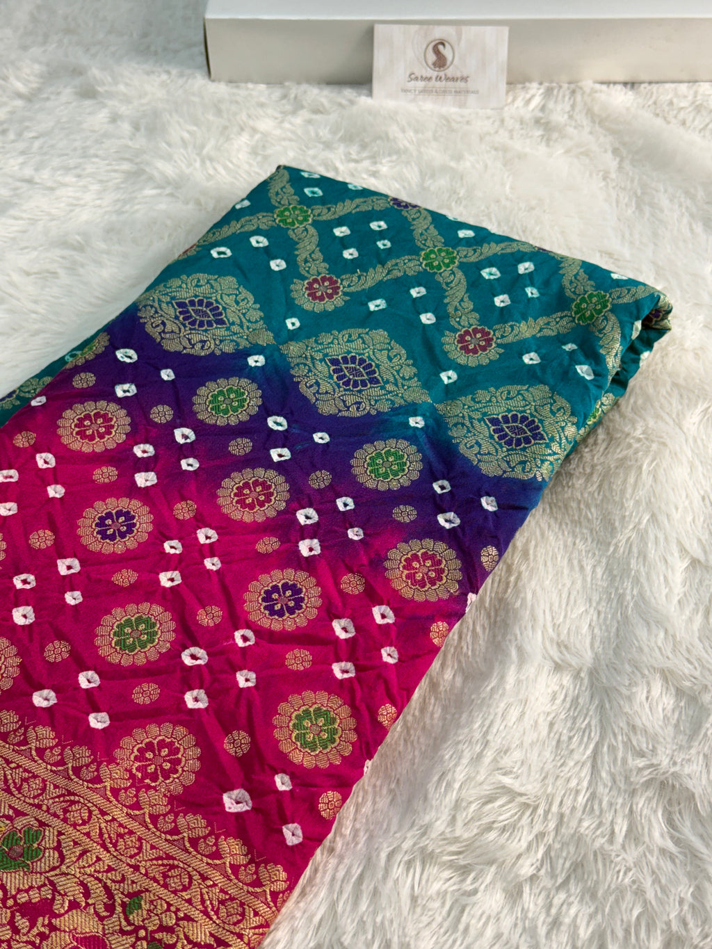 Banarasi Raw Silk Saree with Hand bandej all over in Motifs Design in Rani and Bottle Green Colour