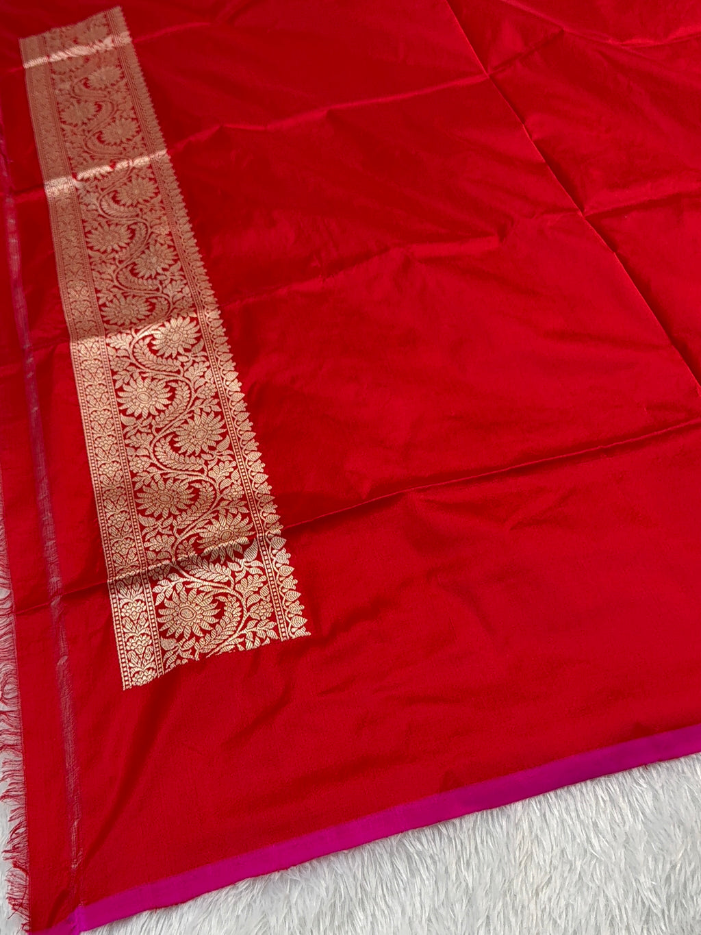 Handwoven pure katan silk saree in Red colour with interlock weaving motifs with intricate silver and gold zari with Rani Colour Edge