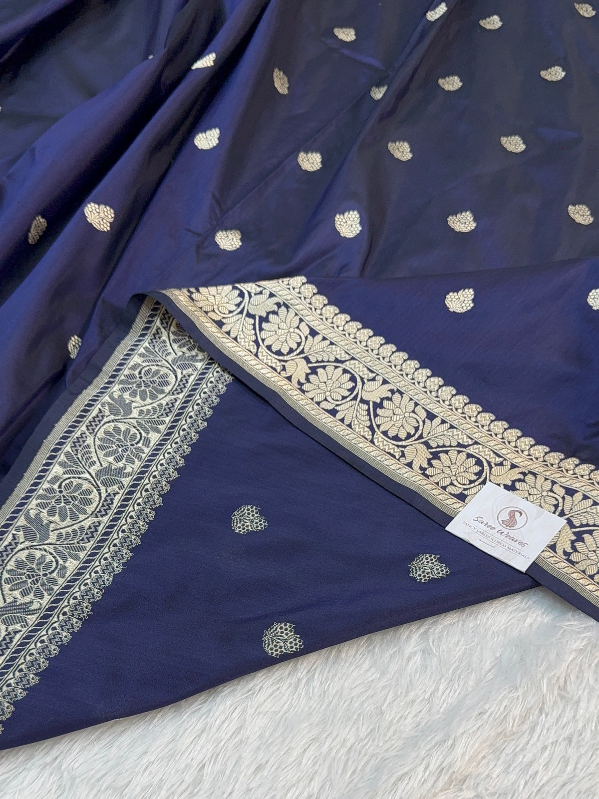 Handwoven pure katan silk saree with interlock weaving motifs in Light gold zari in Navy Blue Colour