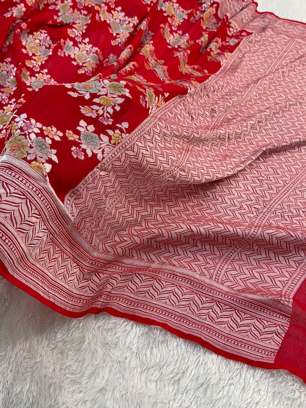 Banarasi Pure Khaddi Chiffon Saree  with Silver Zari Work In Floral Jaal Design with Meenakari by handbrush in Light Red Colour