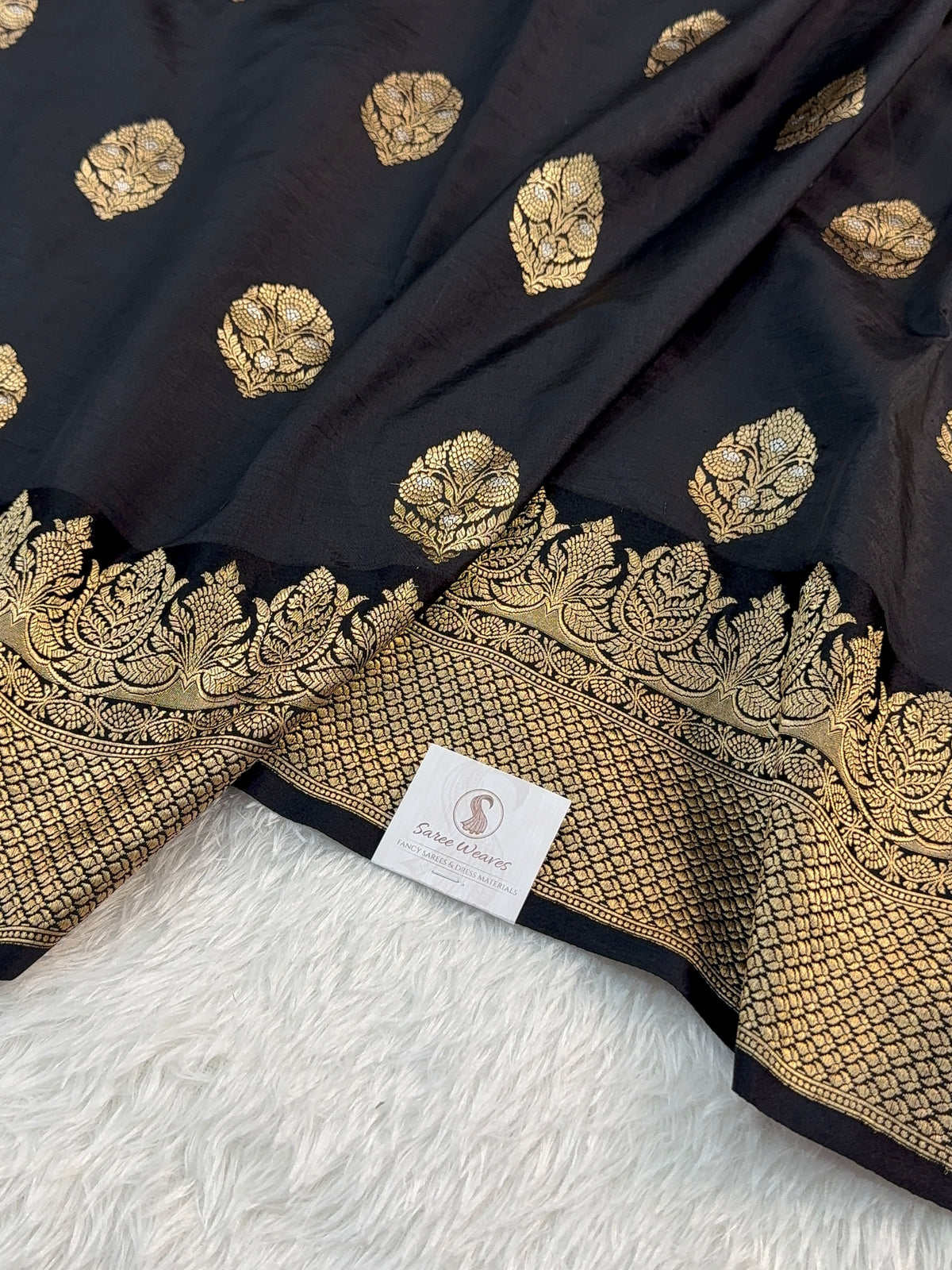 Banarasi Raw Mango Silk Saree with Satin Border and Buta Design In Black Colour