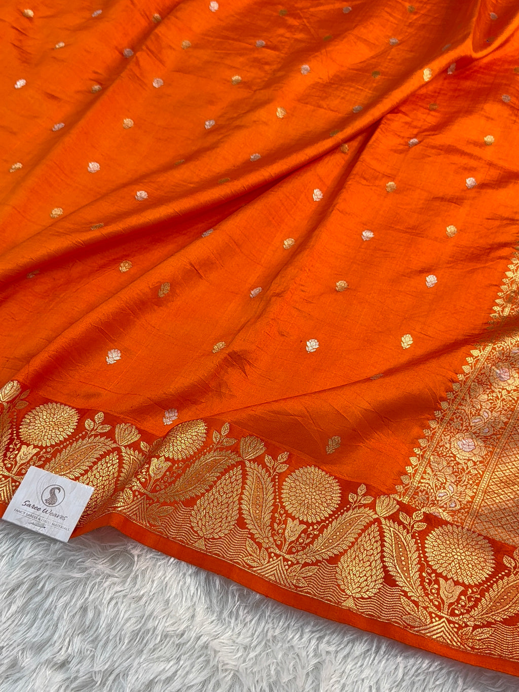 Banarasi Raw Mango Silk Saree in Border and Buti Design in Silver and Gold Zari work in a orange Color