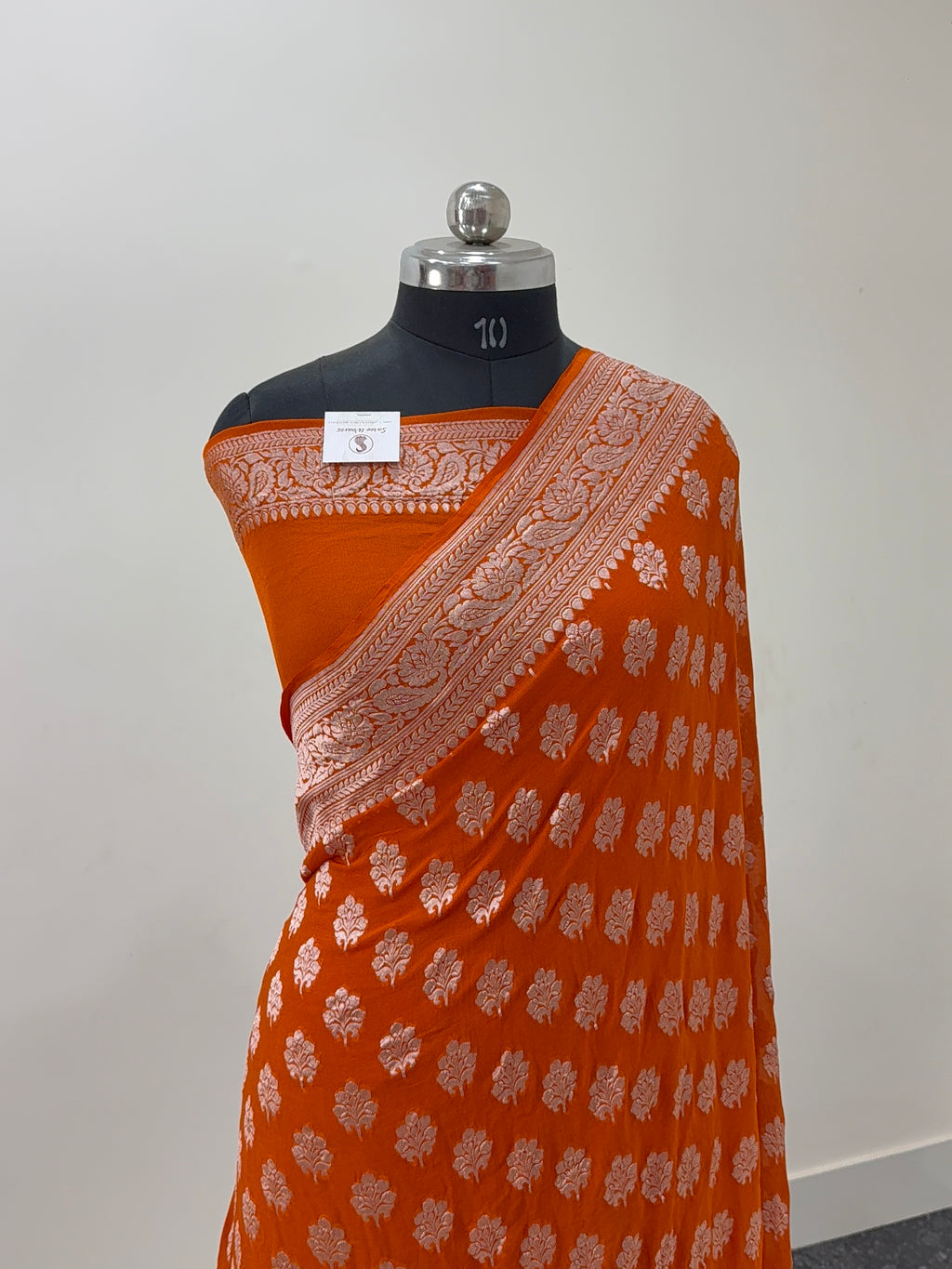 Banarasi Pure Khaddi Chiffon Saree  with Light Gold Zari Work In Floral Motifs Design in Orange Colour