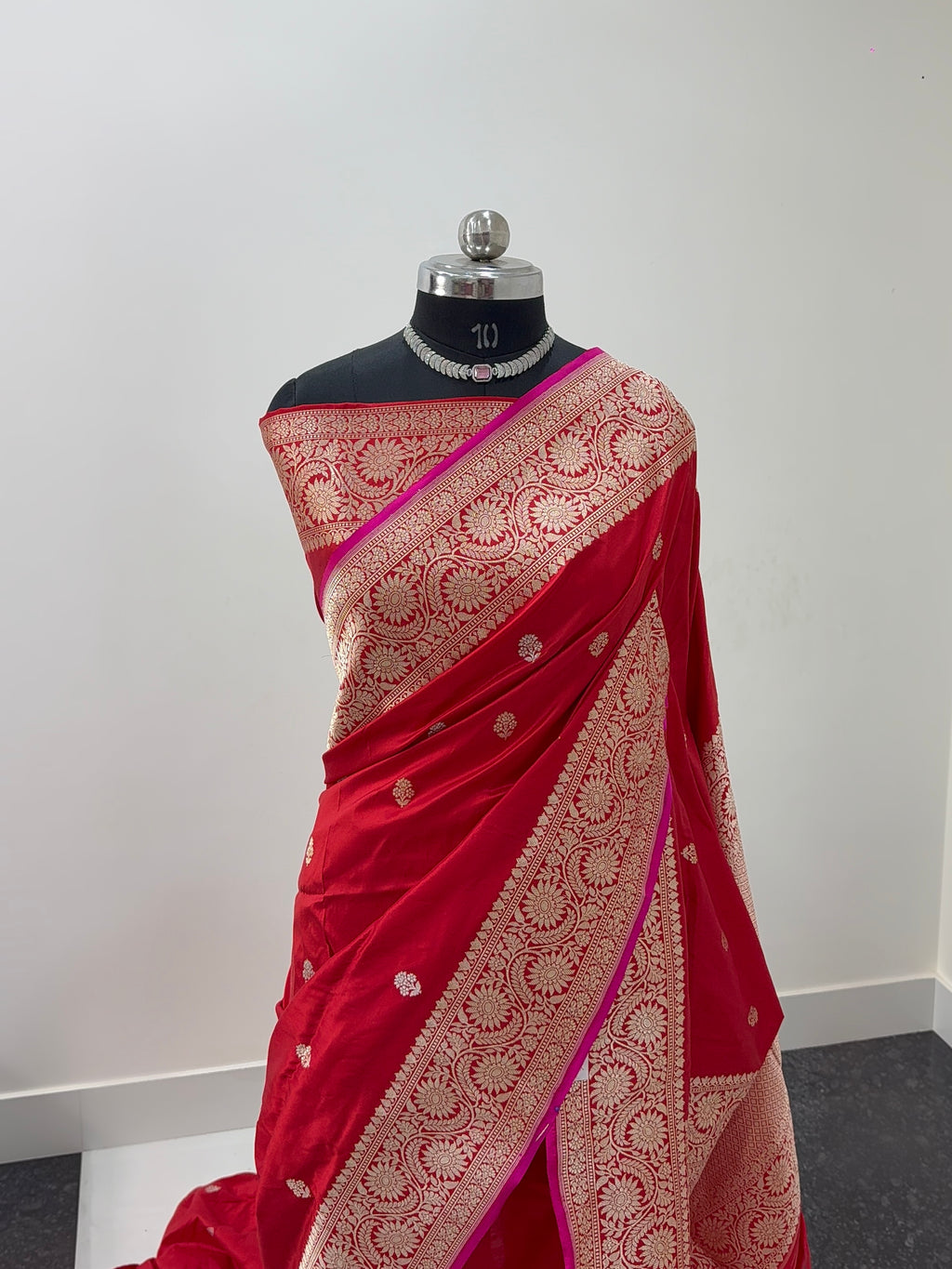 Handwoven pure katan silk saree in Red colour with interlock weaving motifs with intricate silver and gold zari with Rani Colour Edge