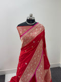Handwoven pure katan silk saree in Red colour with interlock weaving motifs with intricate silver and gold zari with Rani Colour Edge