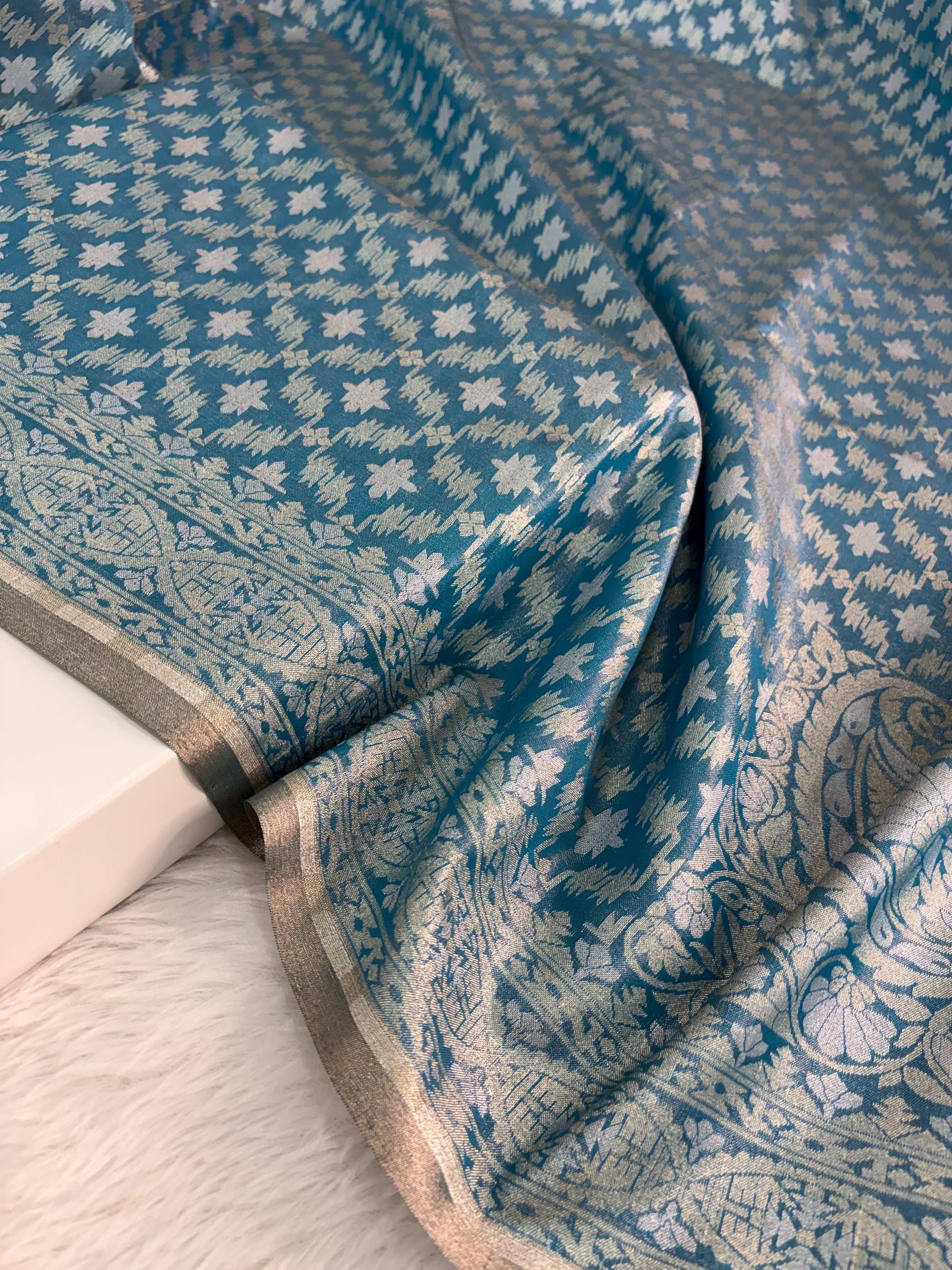 Banarasi tissue silk saree with Koniya design in navy blue color
