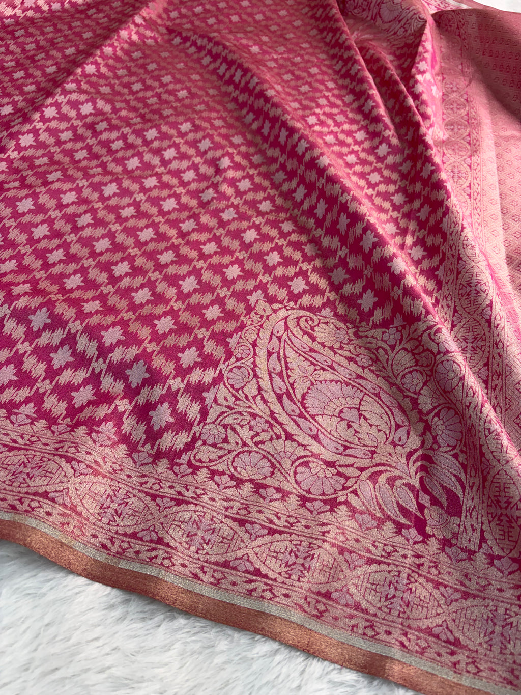 Banarasi tissue silk saree with Koniya design in rusty rani color