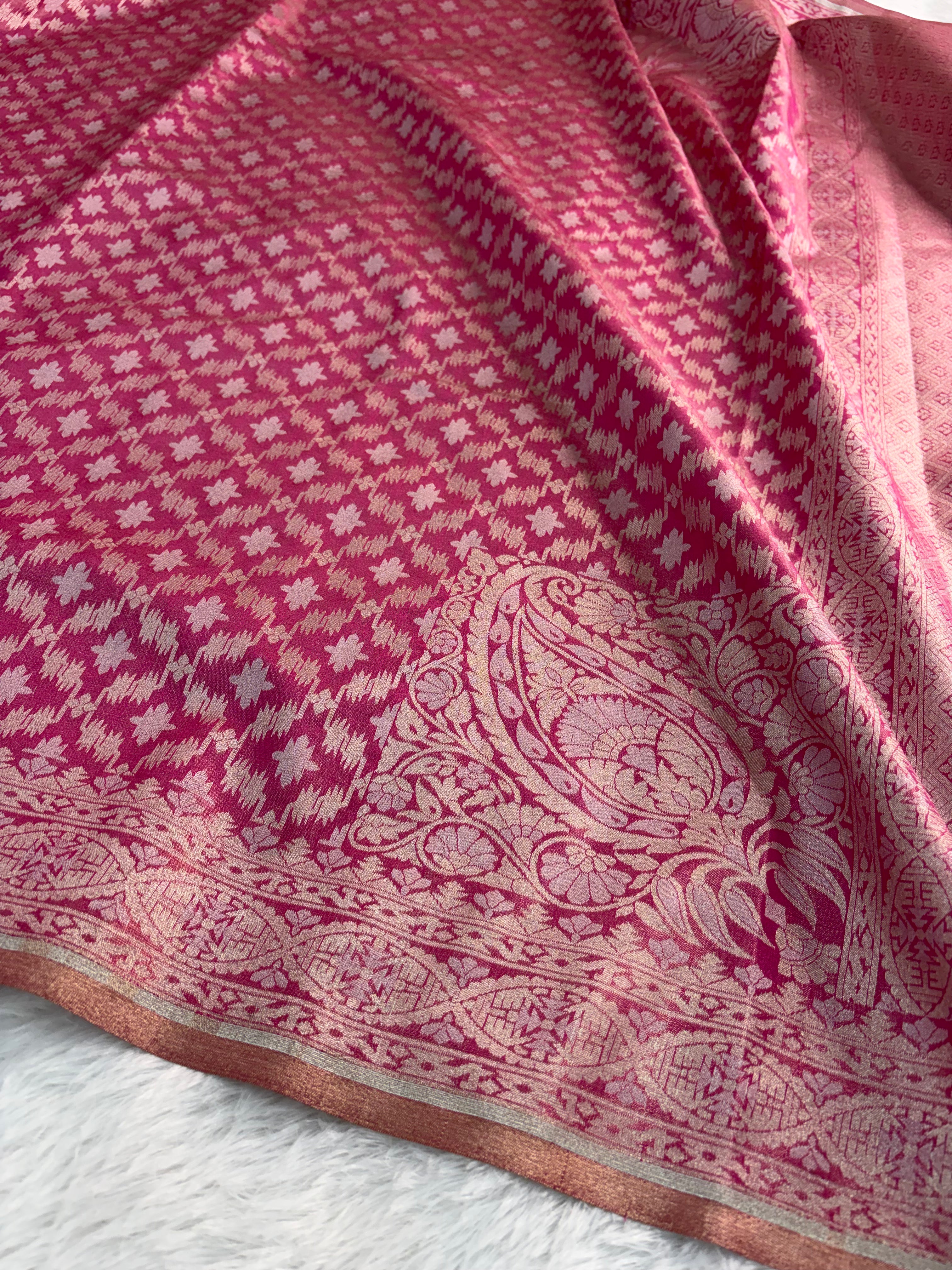 Banarasi tissue silk saree with Koniya design in rusty rani color