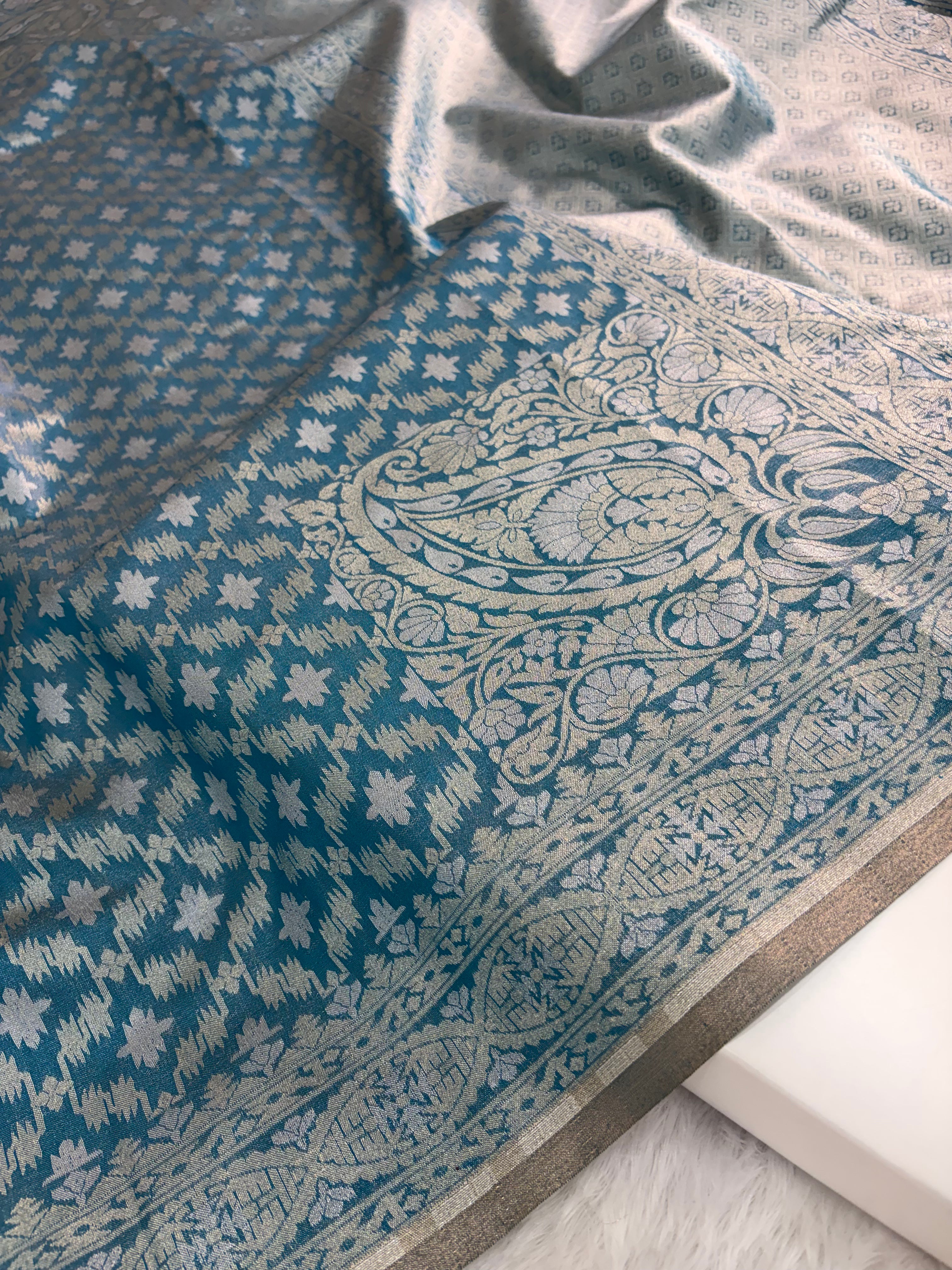 Banarasi tissue silk saree with Koniya design in navy blue color