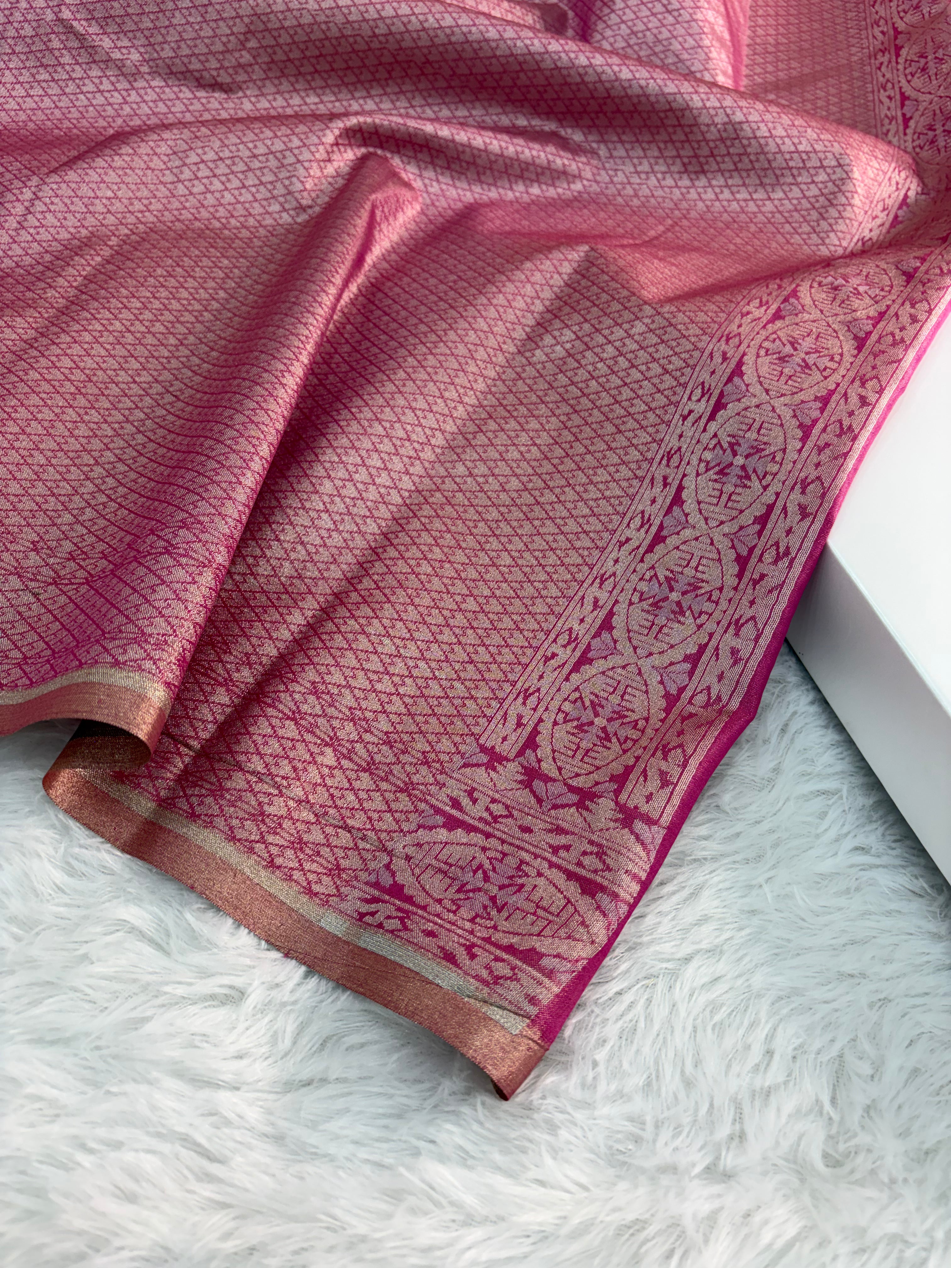 Banarasi tissue silk saree with Koniya design in rusty rani color