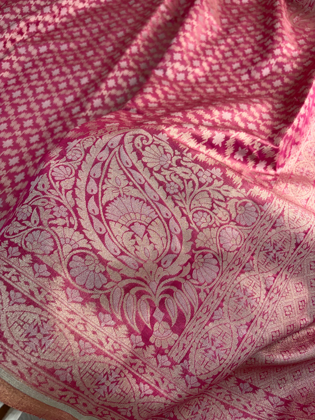 Banarasi tissue silk saree with Koniya design in rusty rani color