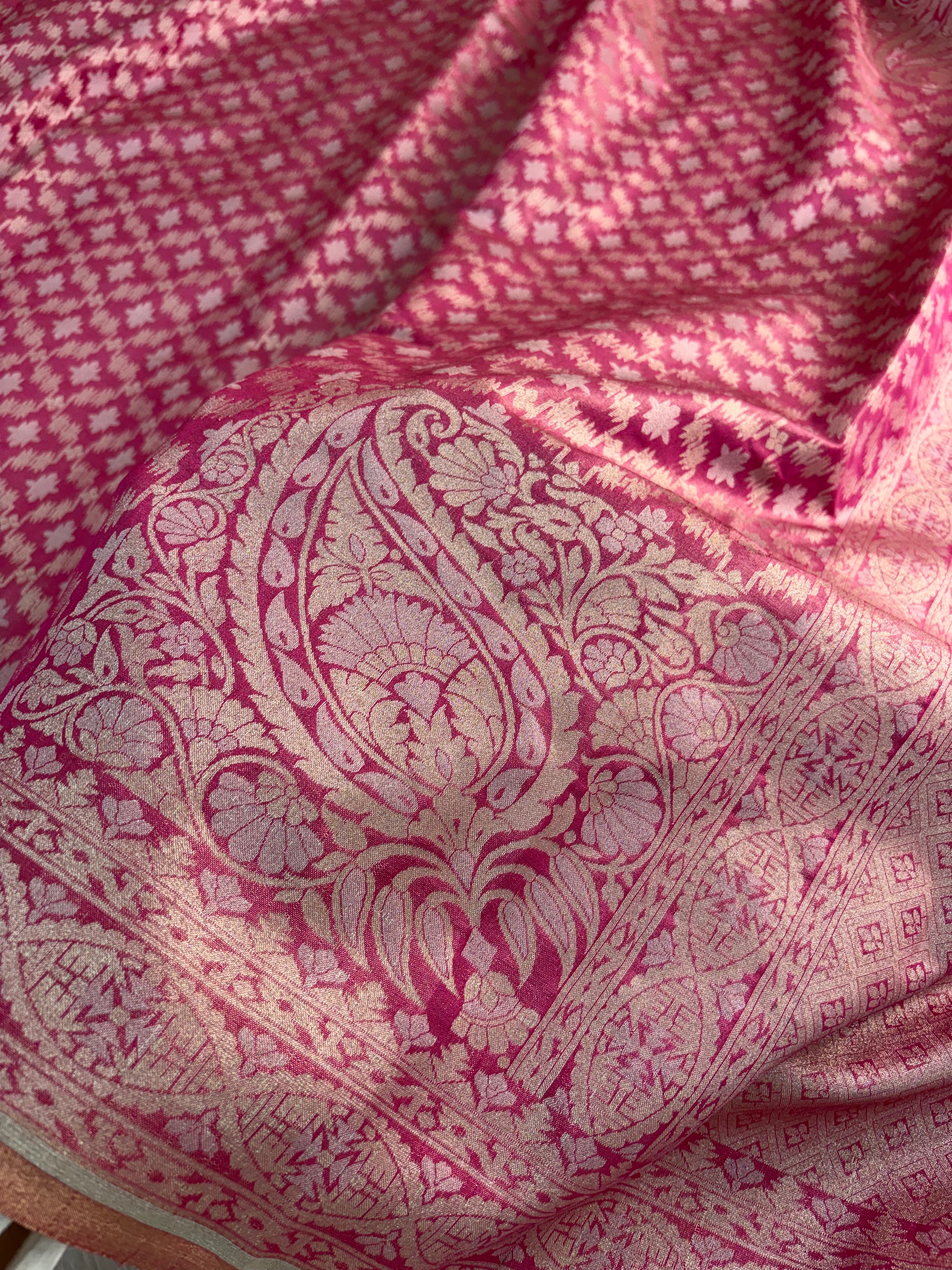 Banarasi tissue silk saree with Koniya design in rusty rani color