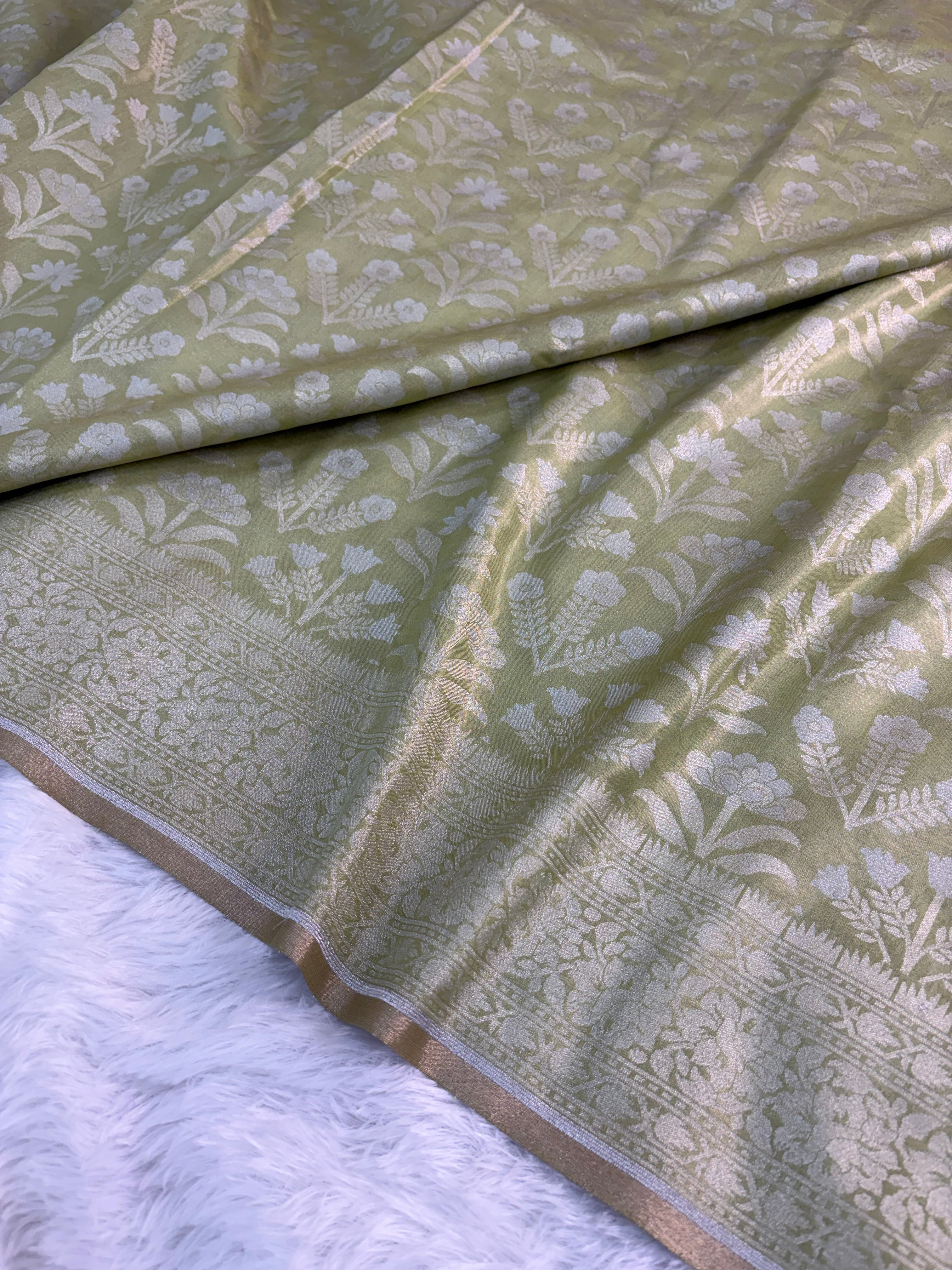Banarasi tissue silk saree with floral buta design in Light Rusty Green color