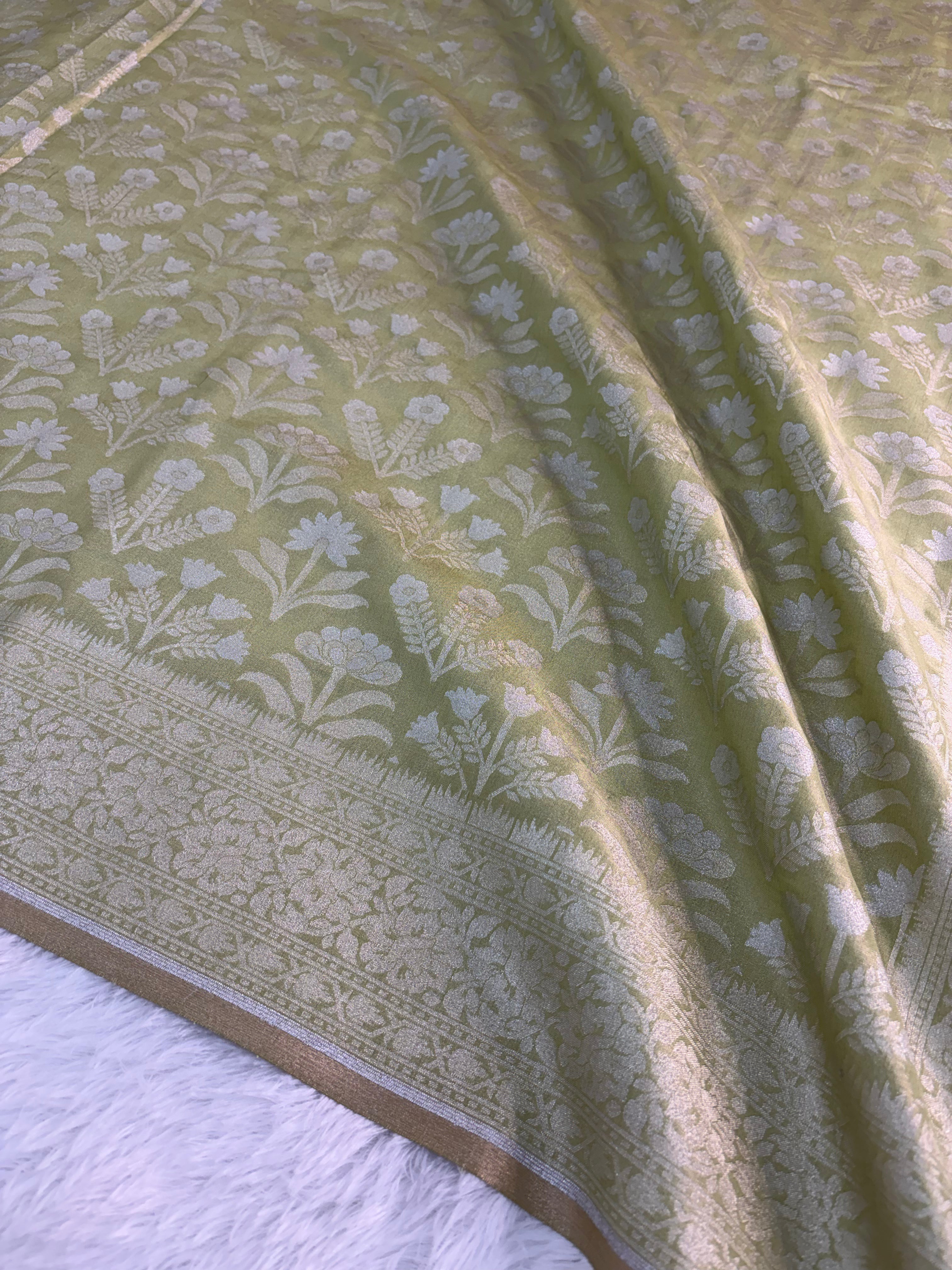 Banarasi tissue silk saree with floral buta design in Light Rusty Green color