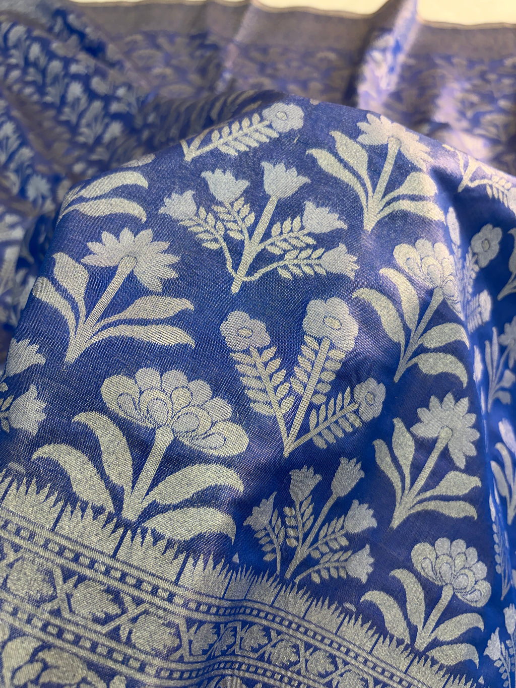Banarasi tissue silk saree with floral buta design in Royal blue color