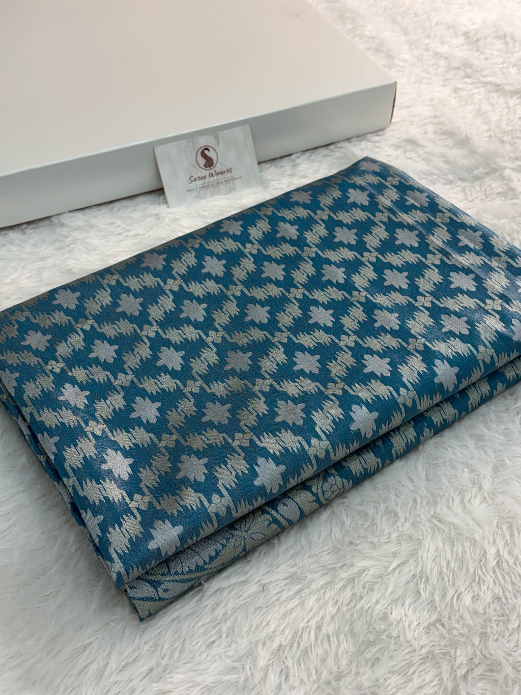 Banarasi tissue silk saree with Koniya design in navy blue color