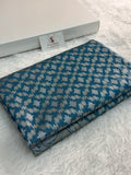 Banarasi tissue silk saree with Koniya design in navy blue color