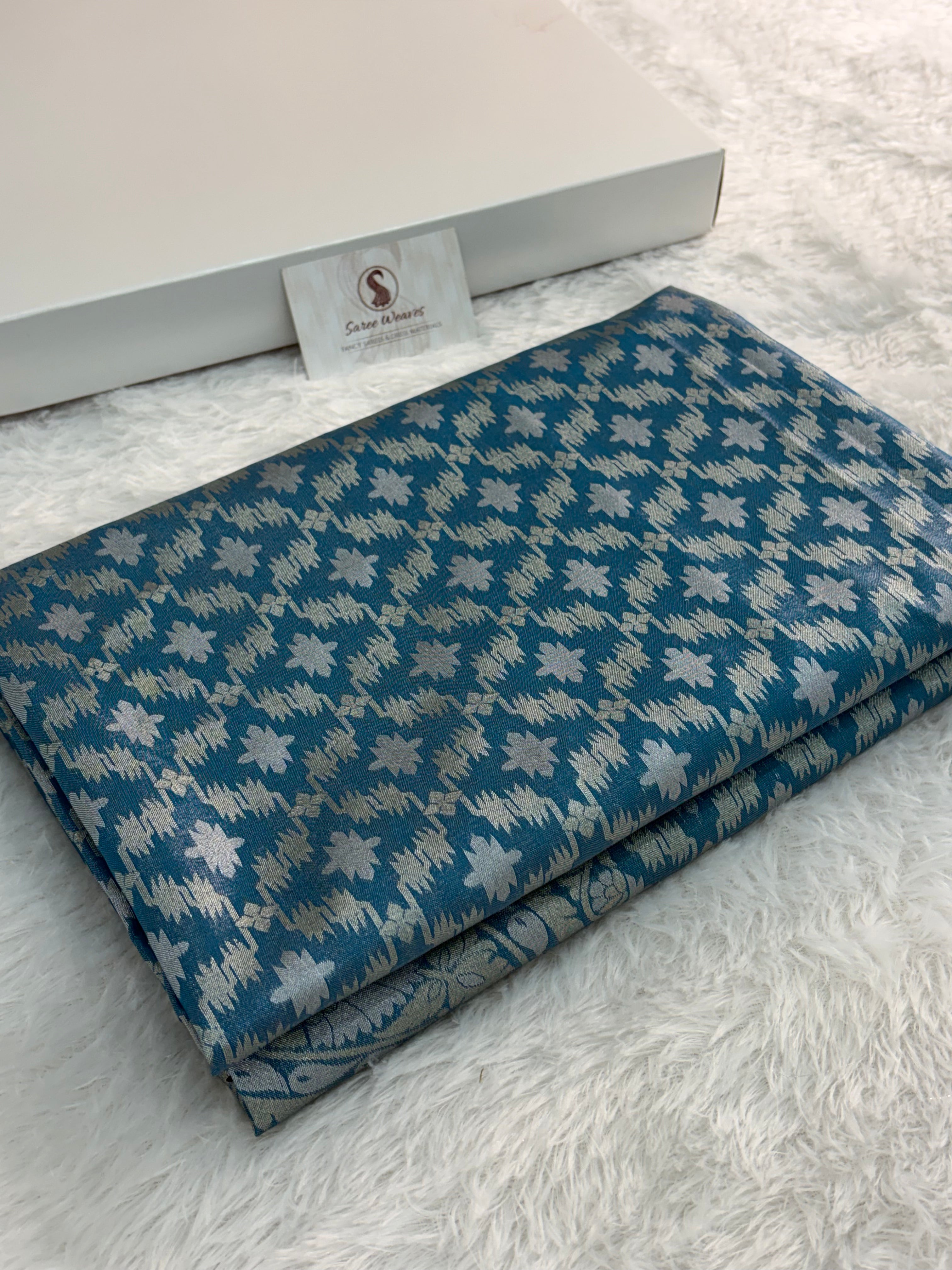 Banarasi tissue silk saree with Koniya design in navy blue color