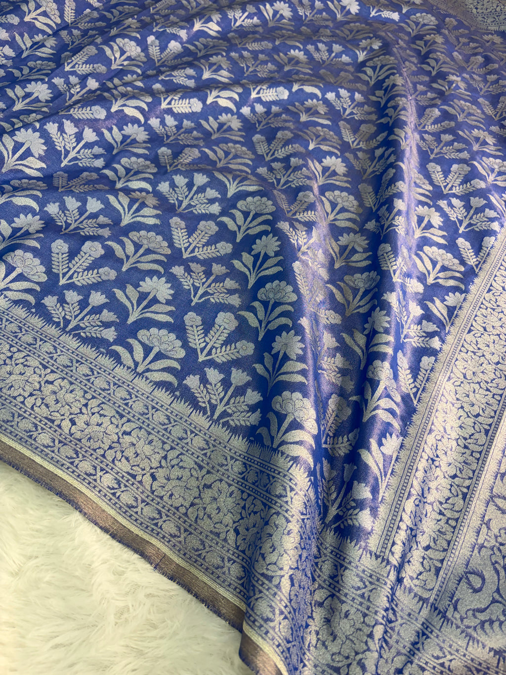 Banarasi tissue silk saree with floral buta design in Royal blue color