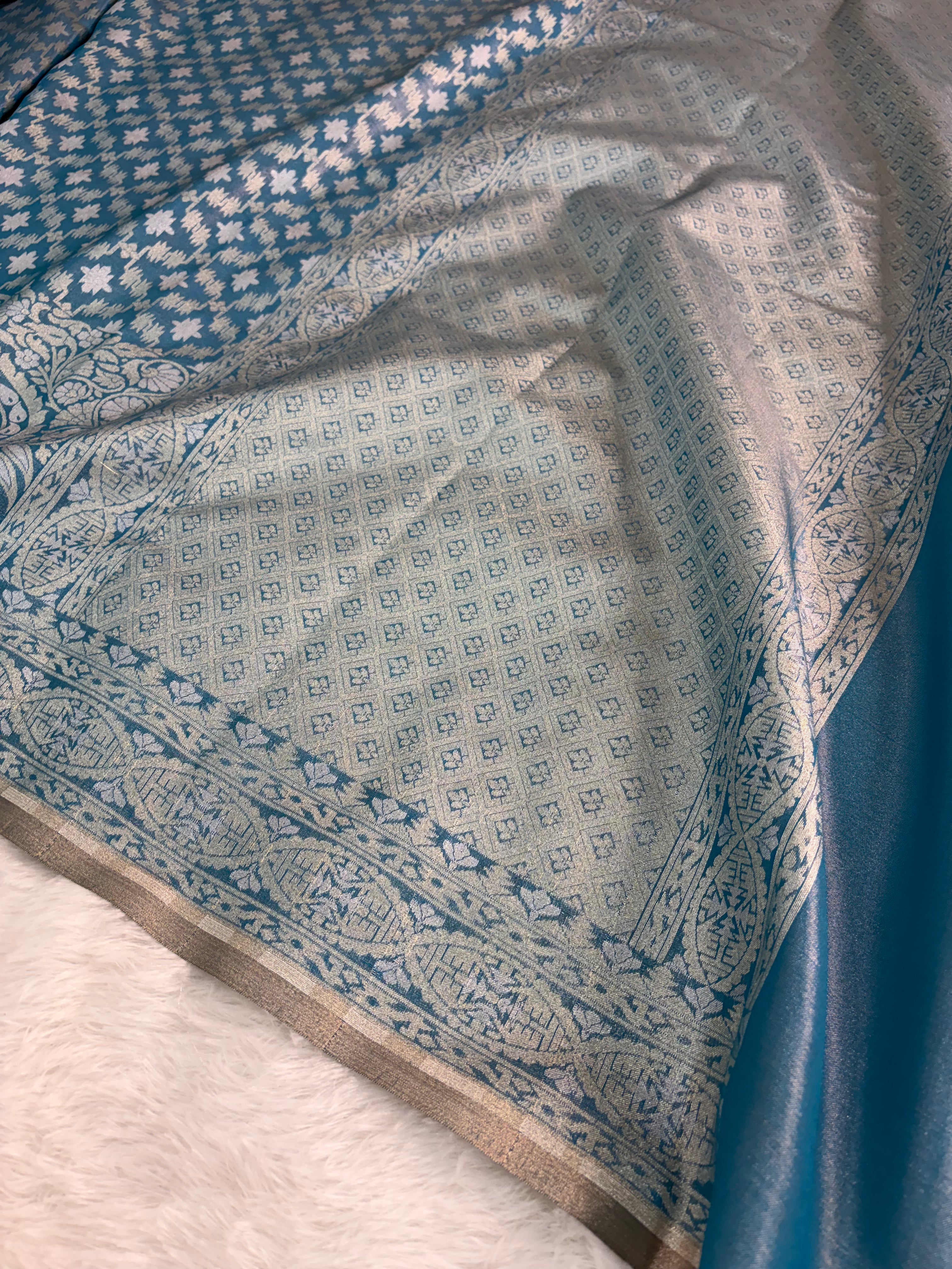 Banarasi tissue silk saree with Koniya design in navy blue color