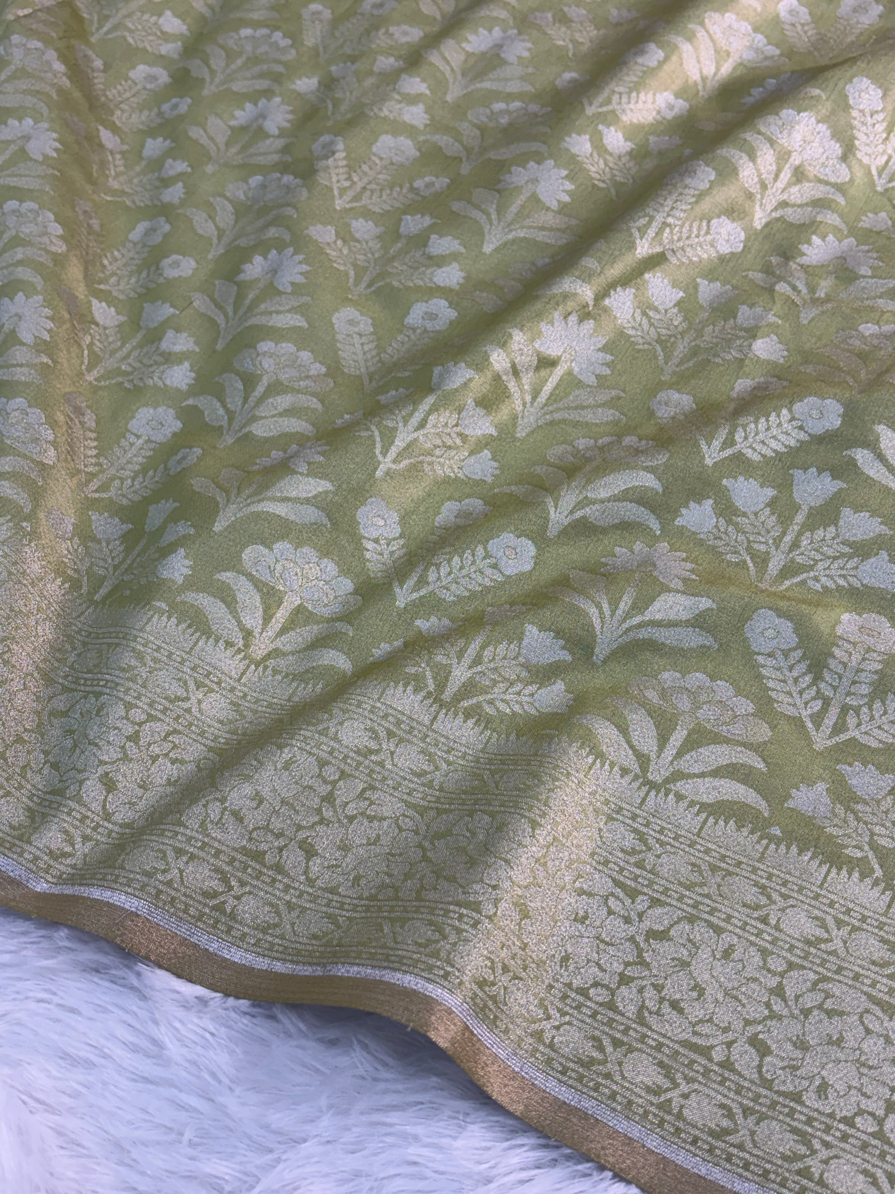 Banarasi tissue silk saree with floral buta design in Light Rusty Green color