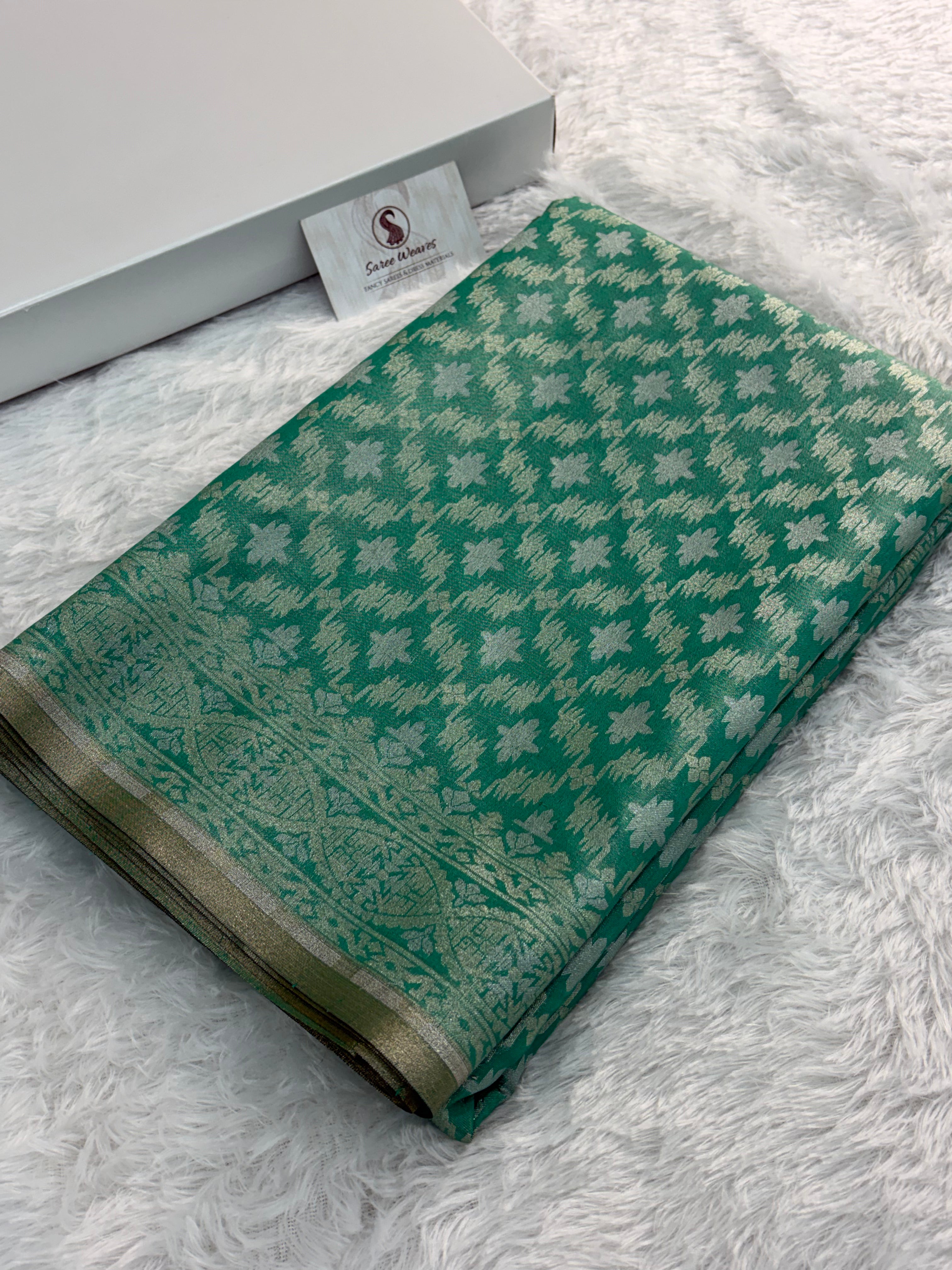 Banarasi tissue silk saree in bottle green color