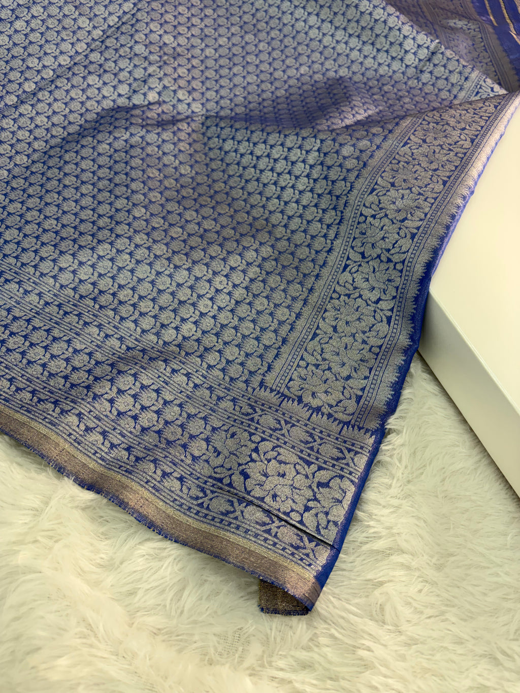 Banarasi tissue silk saree with floral buta design in Royal blue color