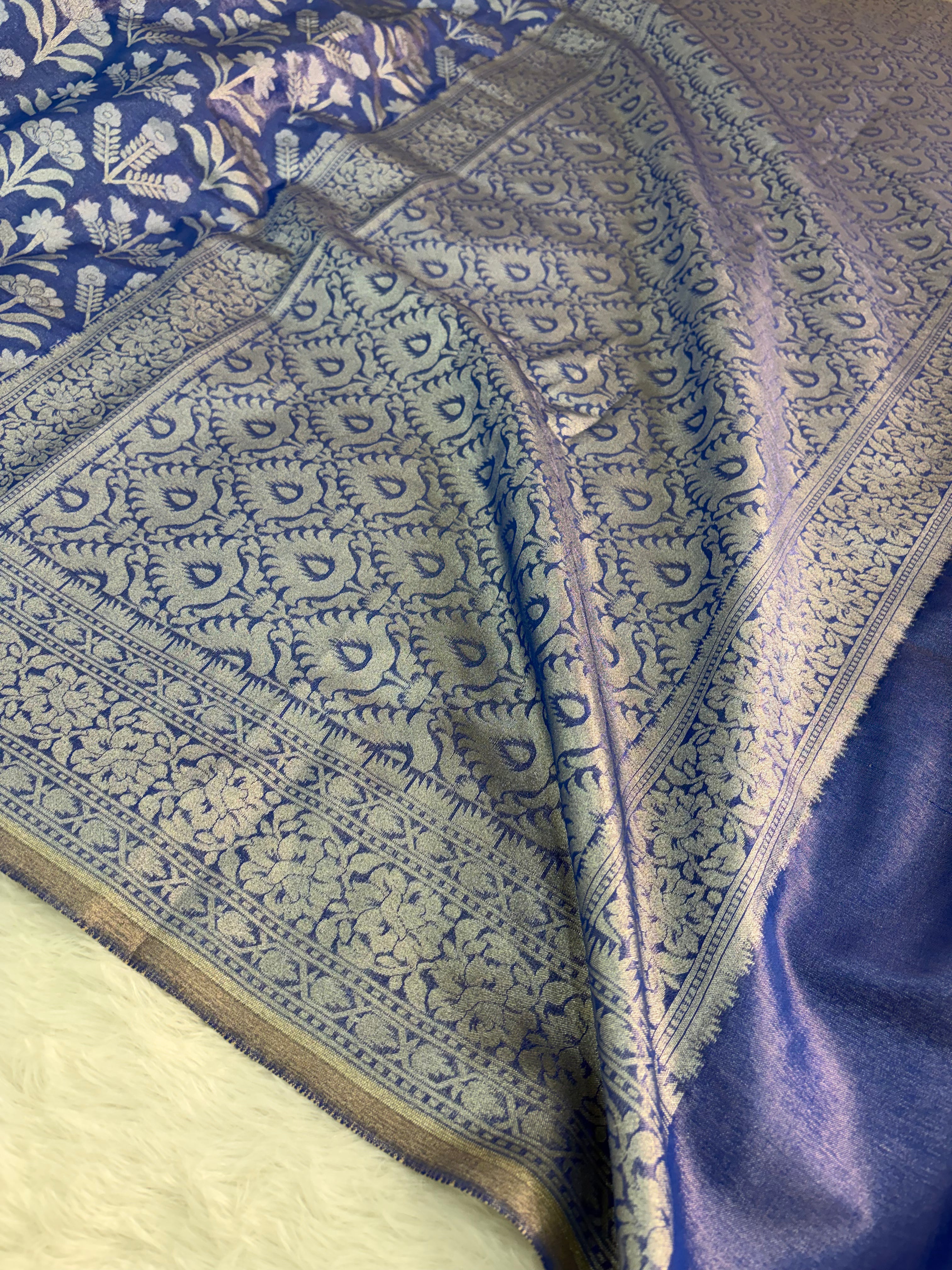 Banarasi tissue silk saree with floral buta design in Royal blue color