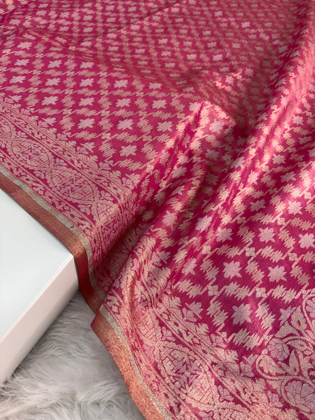 Banarasi tissue silk saree with Koniya design in rusty rani color
