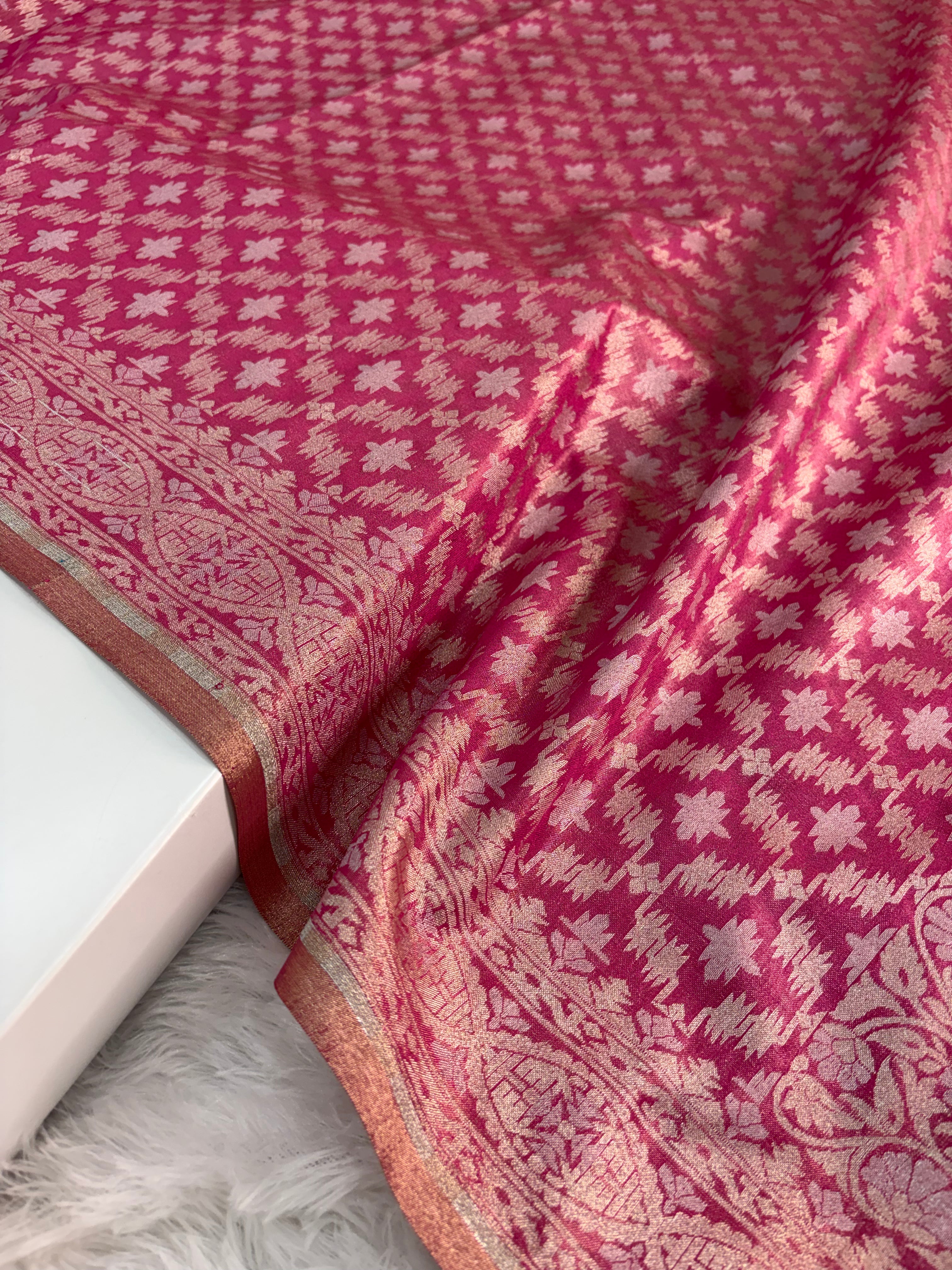 Banarasi tissue silk saree with Koniya design in rusty rani color