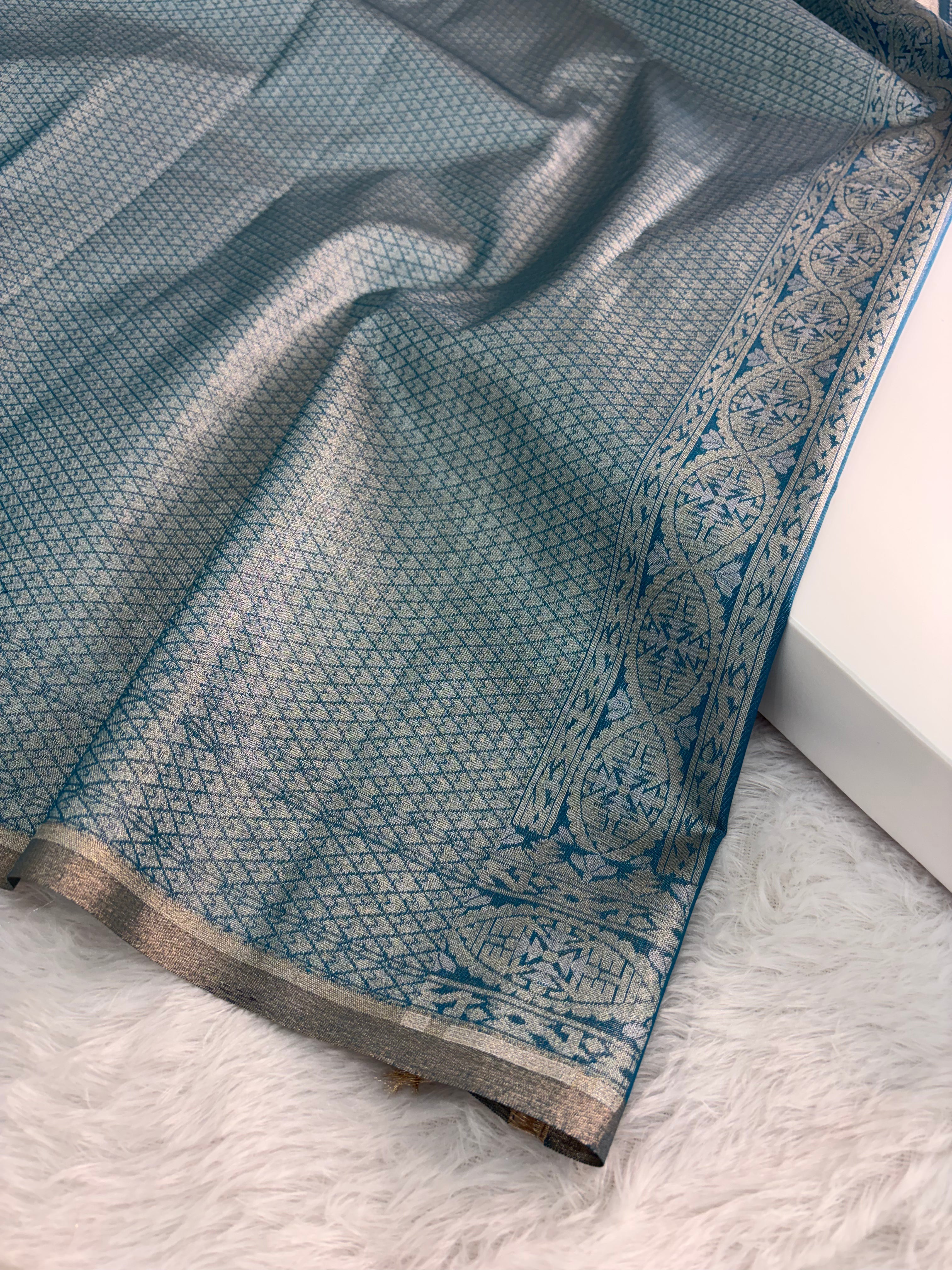 Banarasi tissue silk saree with Koniya design in navy blue color