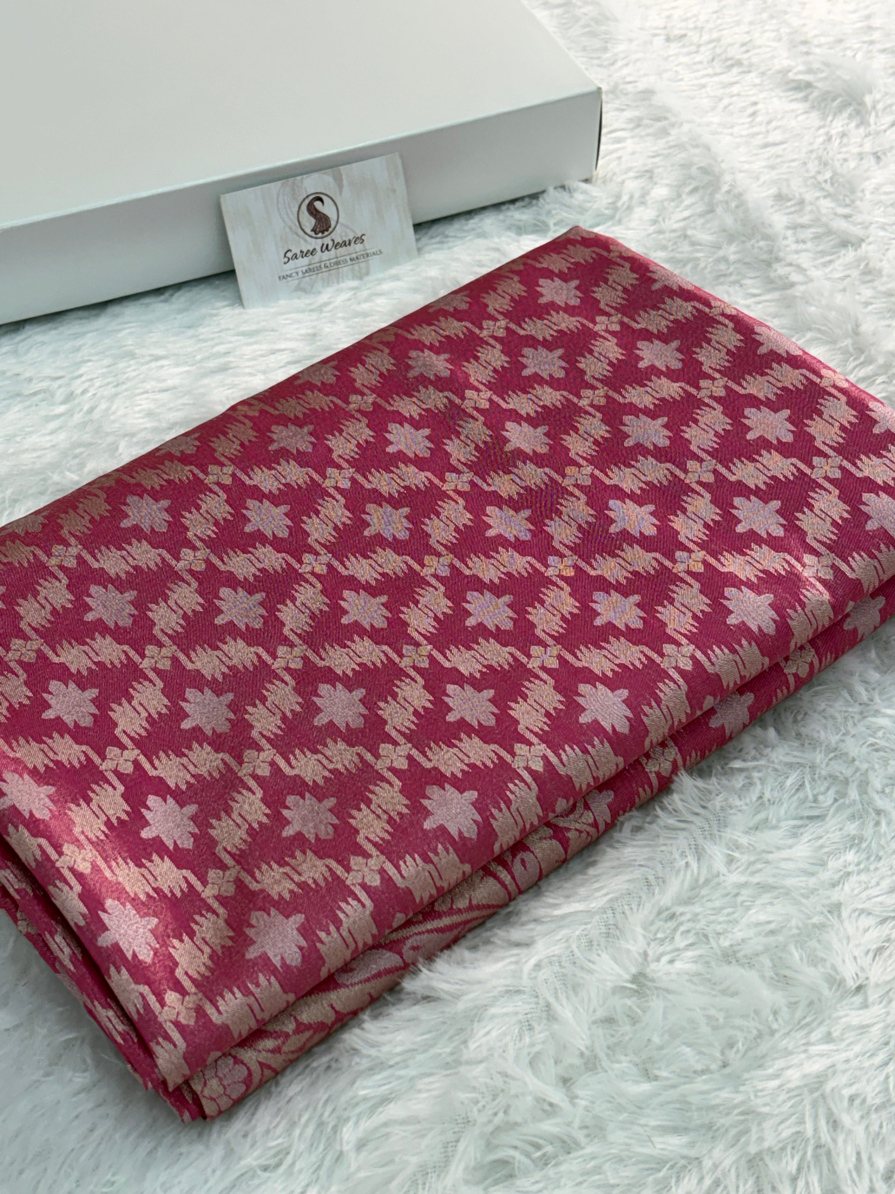 Banarasi tissue silk saree with Koniya design in rusty rani color