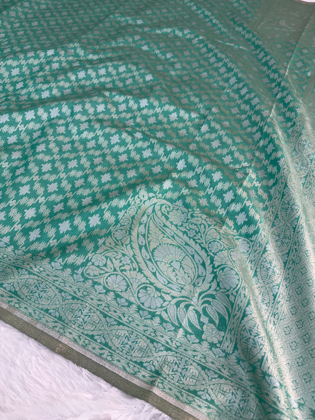 Banarasi tissue silk saree in bottle green color