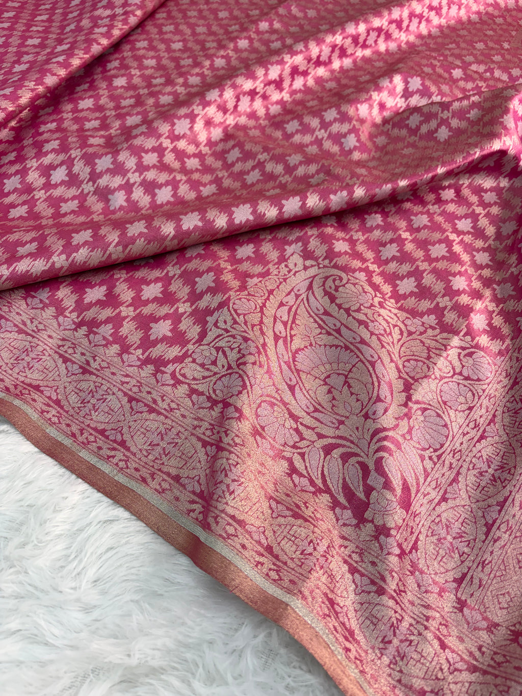 Banarasi tissue silk saree with Koniya design in rusty rani color